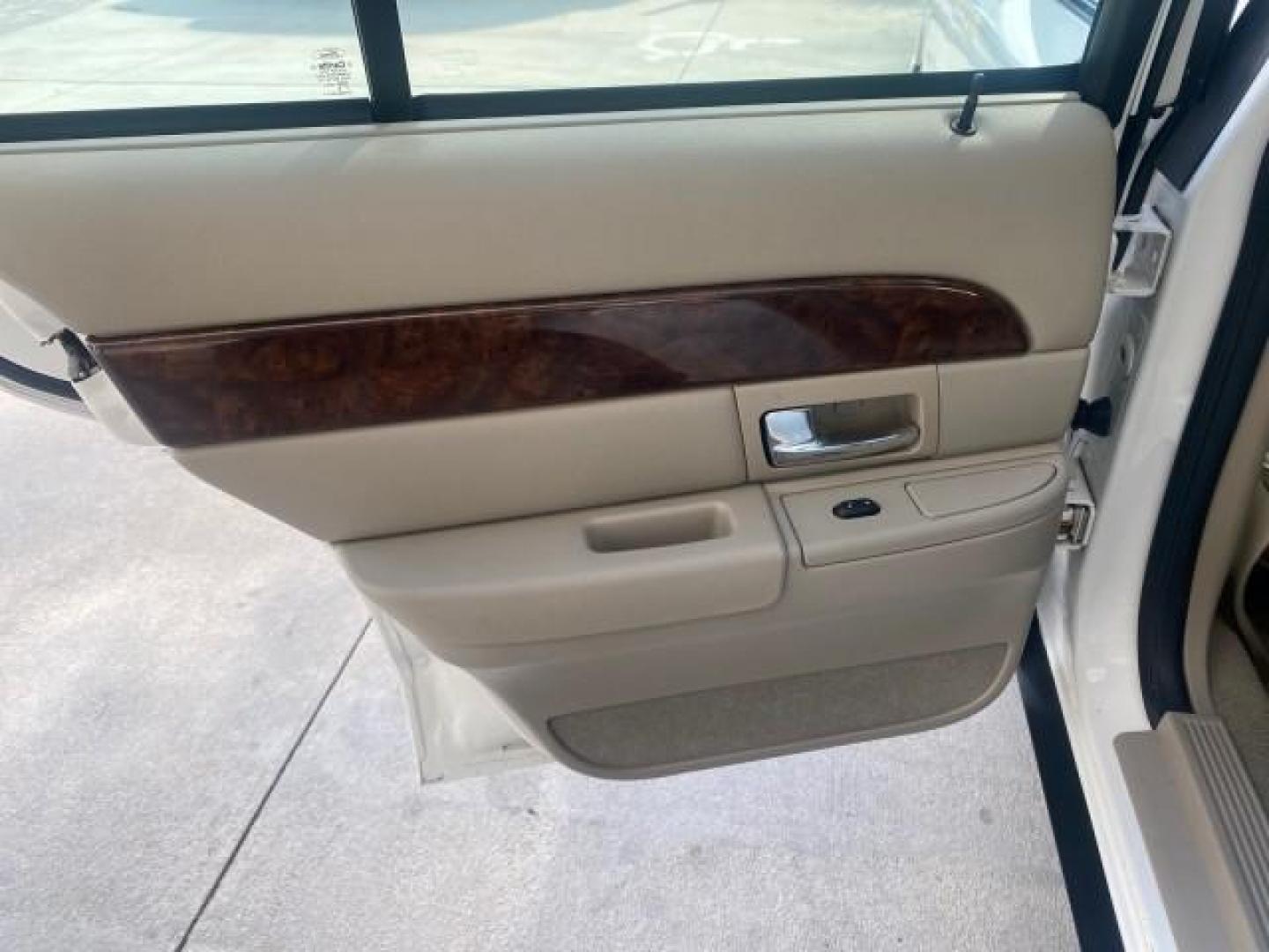 2007 Vibrant White /Med Light Stone Mercury Grand Marquis LS LOW MILES 62,205 (2MEFM75V17X) with an 4.6L SOHC FFV V8 Engine engine, Automatic transmission, located at 4701 North Dixie Hwy, Pompano Beach, FL, 33064, (954) 422-2889, 26.240938, -80.123474 - OUR WEBPAGE FLORIDACARS1.COM HAS OVER 100 PHOTOS AND FREE CARFAX LINK 2007 MERCURY GRAND MARQUIS LS VIN: 2MEFM75V17X635847 2 M E F M 7 5 V 1 7 X 6 3 5 8 4 7 SEDAN 4 DR 4.6L V8 F SOHC FLEX FUEL REAR WHEEL DRIVE Features ABS Brakes Air Conditioning Alloy Wheels AM/FM Stereo Automatic Transmission Cass - Photo#70