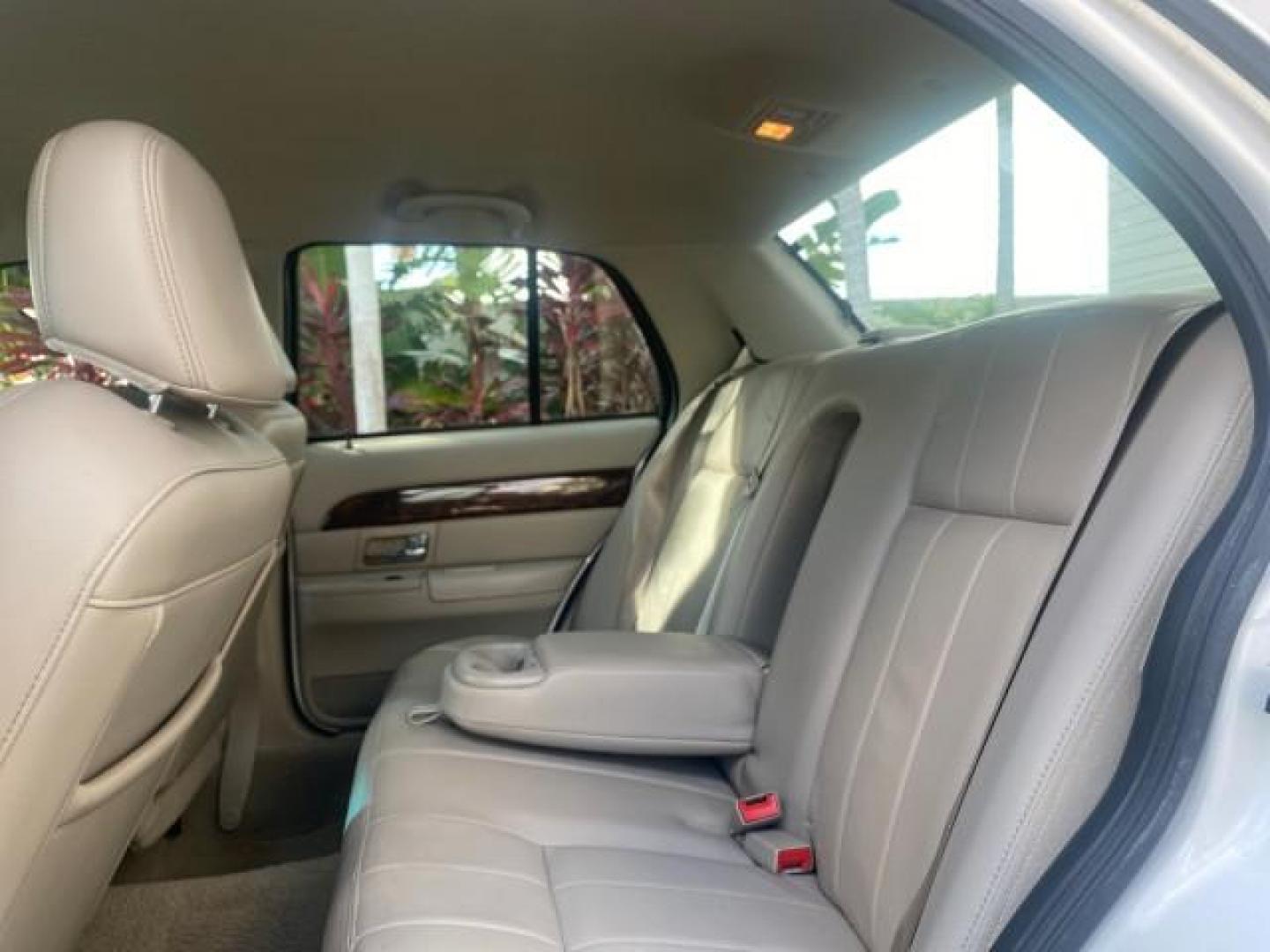 2007 Vibrant White /Med Light Stone Mercury Grand Marquis LS LOW MILES 62,205 (2MEFM75V17X) with an 4.6L SOHC FFV V8 Engine engine, Automatic transmission, located at 4701 North Dixie Hwy, Pompano Beach, FL, 33064, (954) 422-2889, 26.240938, -80.123474 - OUR WEBPAGE FLORIDACARS1.COM HAS OVER 100 PHOTOS AND FREE CARFAX LINK 2007 MERCURY GRAND MARQUIS LS VIN: 2MEFM75V17X635847 2 M E F M 7 5 V 1 7 X 6 3 5 8 4 7 SEDAN 4 DR 4.6L V8 F SOHC FLEX FUEL REAR WHEEL DRIVE Features ABS Brakes Air Conditioning Alloy Wheels AM/FM Stereo Automatic Transmission Cass - Photo#71