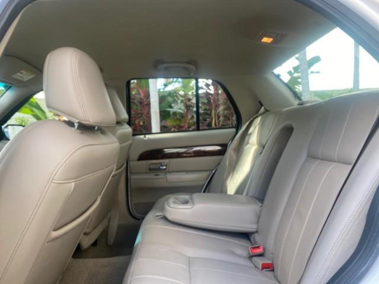 2007 Vibrant White /Med Light Stone Mercury Grand Marquis LS LOW MILES 62,205 (2MEFM75V17X) with an 4.6L SOHC FFV V8 Engine engine, Automatic transmission, located at 4701 North Dixie Hwy, Pompano Beach, FL, 33064, (954) 422-2889, 26.240938, -80.123474 - OUR WEBPAGE FLORIDACARS1.COM HAS OVER 100 PHOTOS AND FREE CARFAX LINK 2007 MERCURY GRAND MARQUIS LS VIN: 2MEFM75V17X635847 2 M E F M 7 5 V 1 7 X 6 3 5 8 4 7 SEDAN 4 DR 4.6L V8 F SOHC FLEX FUEL REAR WHEEL DRIVE Features ABS Brakes Air Conditioning Alloy Wheels AM/FM Stereo Automatic Transmission Cass - Photo#72