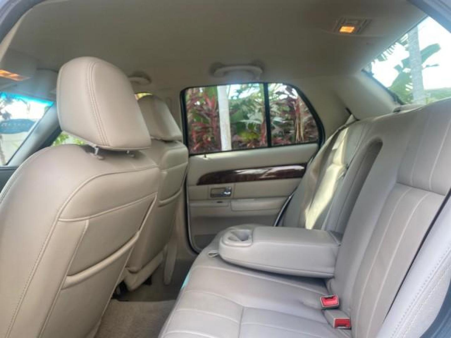 2007 Vibrant White /Med Light Stone Mercury Grand Marquis LS LOW MILES 62,205 (2MEFM75V17X) with an 4.6L SOHC FFV V8 Engine engine, Automatic transmission, located at 4701 North Dixie Hwy, Pompano Beach, FL, 33064, (954) 422-2889, 26.240938, -80.123474 - OUR WEBPAGE FLORIDACARS1.COM HAS OVER 100 PHOTOS AND FREE CARFAX LINK 2007 MERCURY GRAND MARQUIS LS VIN: 2MEFM75V17X635847 2 M E F M 7 5 V 1 7 X 6 3 5 8 4 7 SEDAN 4 DR 4.6L V8 F SOHC FLEX FUEL REAR WHEEL DRIVE Features ABS Brakes Air Conditioning Alloy Wheels AM/FM Stereo Automatic Transmission Cass - Photo#73