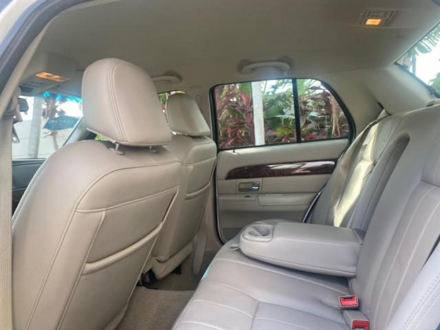 2007 Vibrant White /Med Light Stone Mercury Grand Marquis LS LOW MILES 62,205 (2MEFM75V17X) with an 4.6L SOHC FFV V8 Engine engine, Automatic transmission, located at 4701 North Dixie Hwy, Pompano Beach, FL, 33064, (954) 422-2889, 26.240938, -80.123474 - OUR WEBPAGE FLORIDACARS1.COM HAS OVER 100 PHOTOS AND FREE CARFAX LINK 2007 MERCURY GRAND MARQUIS LS VIN: 2MEFM75V17X635847 2 M E F M 7 5 V 1 7 X 6 3 5 8 4 7 SEDAN 4 DR 4.6L V8 F SOHC FLEX FUEL REAR WHEEL DRIVE Features ABS Brakes Air Conditioning Alloy Wheels AM/FM Stereo Automatic Transmission Cass - Photo#74