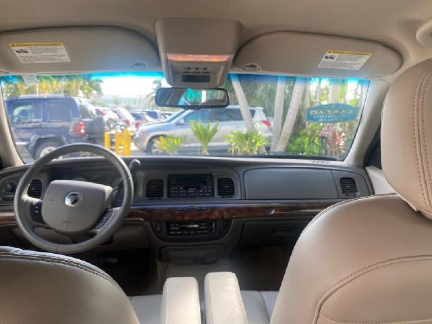 2007 Vibrant White /Med Light Stone Mercury Grand Marquis LS LOW MILES 62,205 (2MEFM75V17X) with an 4.6L SOHC FFV V8 Engine engine, Automatic transmission, located at 4701 North Dixie Hwy, Pompano Beach, FL, 33064, (954) 422-2889, 26.240938, -80.123474 - OUR WEBPAGE FLORIDACARS1.COM HAS OVER 100 PHOTOS AND FREE CARFAX LINK 2007 MERCURY GRAND MARQUIS LS VIN: 2MEFM75V17X635847 2 M E F M 7 5 V 1 7 X 6 3 5 8 4 7 SEDAN 4 DR 4.6L V8 F SOHC FLEX FUEL REAR WHEEL DRIVE Features ABS Brakes Air Conditioning Alloy Wheels AM/FM Stereo Automatic Transmission Cass - Photo#75