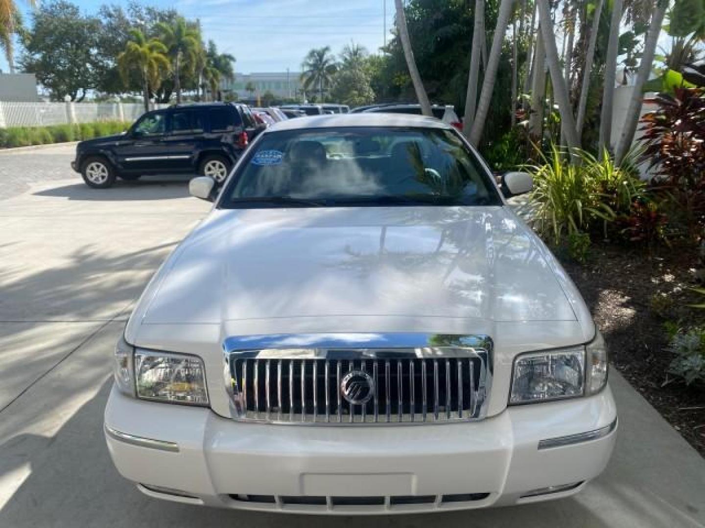 2007 Vibrant White /Med Light Stone Mercury Grand Marquis LS LOW MILES 62,205 (2MEFM75V17X) with an 4.6L SOHC FFV V8 Engine engine, Automatic transmission, located at 4701 North Dixie Hwy, Pompano Beach, FL, 33064, (954) 422-2889, 26.240938, -80.123474 - OUR WEBPAGE FLORIDACARS1.COM HAS OVER 100 PHOTOS AND FREE CARFAX LINK 2007 MERCURY GRAND MARQUIS LS VIN: 2MEFM75V17X635847 2 M E F M 7 5 V 1 7 X 6 3 5 8 4 7 SEDAN 4 DR 4.6L V8 F SOHC FLEX FUEL REAR WHEEL DRIVE Features ABS Brakes Air Conditioning Alloy Wheels AM/FM Stereo Automatic Transmission Cass - Photo#96