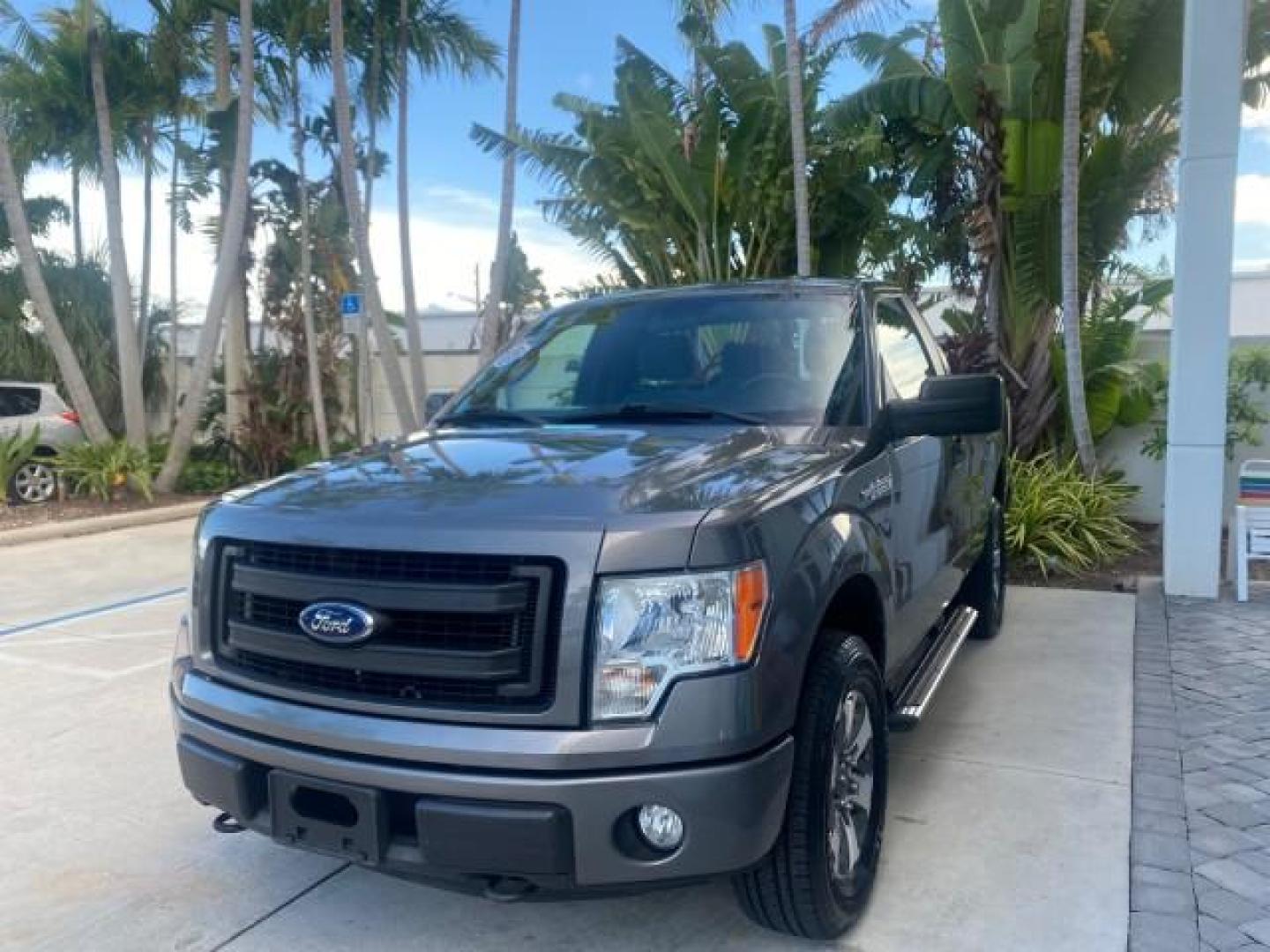 2013 Sterling Gray Metallic /Steel Gray Ford F-150 STX 4WD LOW MILES 27,133 1 OWNER (1FTMF1EF3DF) with an 5.0L V8 FFV Engine engine, Automatic transmission, located at 4701 North Dixie Hwy, Pompano Beach, FL, 33064, (954) 422-2889, 26.240938, -80.123474 - OUR WEBPAGE FLORIDACARS1.COM HAS OVER 100 PHOTOS AND FREE CARFAX LINK 2013 FORD F-150 STX VIN: 1FTMF1EF3DFC39967 1 F T M F 1 E F 3 D F C 3 9 9 6 7 PICKUP 5.0L V8 F DOHC 32V FLEX FUEL REAR WHEEL DRIVE W/ 4X4 Features 4WD/AWD ABS Brakes Air Conditioning Alloy Wheels AM/FM Stereo Automatic Transmission - Photo#3