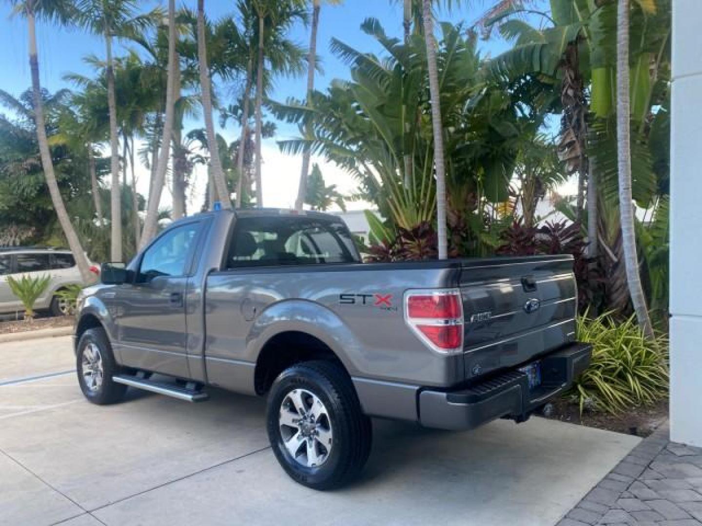 2013 Sterling Gray Metallic /Steel Gray Ford F-150 STX 4WD LOW MILES 27,133 1 OWNER (1FTMF1EF3DF) with an 5.0L V8 FFV Engine engine, Automatic transmission, located at 4701 North Dixie Hwy, Pompano Beach, FL, 33064, (954) 422-2889, 26.240938, -80.123474 - OUR WEBPAGE FLORIDACARS1.COM HAS OVER 100 PHOTOS AND FREE CARFAX LINK 2013 FORD F-150 STX VIN: 1FTMF1EF3DFC39967 1 F T M F 1 E F 3 D F C 3 9 9 6 7 PICKUP 5.0L V8 F DOHC 32V FLEX FUEL REAR WHEEL DRIVE W/ 4X4 Features 4WD/AWD ABS Brakes Air Conditioning Alloy Wheels AM/FM Stereo Automatic Transmission - Photo#5