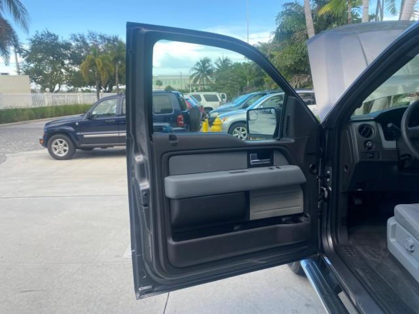 2013 Sterling Gray Metallic /Steel Gray Ford F-150 STX 4WD LOW MILES 27,133 1 OWNER (1FTMF1EF3DF) with an 5.0L V8 FFV Engine engine, Automatic transmission, located at 4701 North Dixie Hwy, Pompano Beach, FL, 33064, (954) 422-2889, 26.240938, -80.123474 - OUR WEBPAGE FLORIDACARS1.COM HAS OVER 100 PHOTOS AND FREE CARFAX LINK 2013 FORD F-150 STX VIN: 1FTMF1EF3DFC39967 1 F T M F 1 E F 3 D F C 3 9 9 6 7 PICKUP 5.0L V8 F DOHC 32V FLEX FUEL REAR WHEEL DRIVE W/ 4X4 Features 4WD/AWD ABS Brakes Air Conditioning Alloy Wheels AM/FM Stereo Automatic Transmission - Photo#9