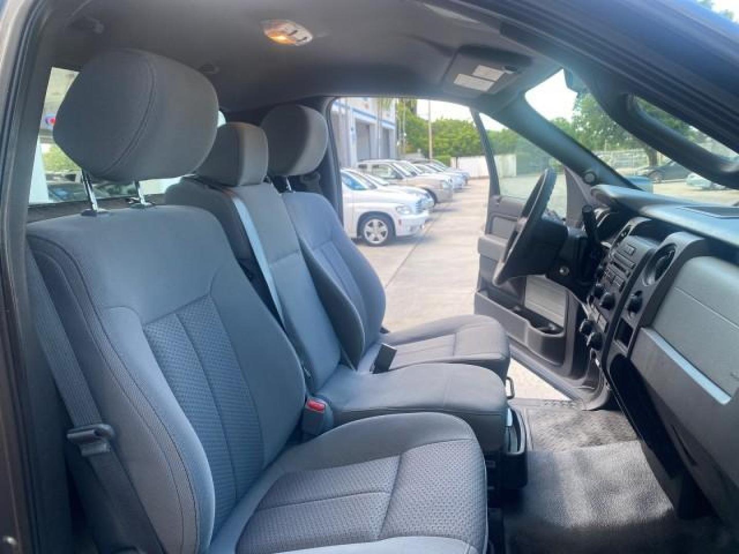 2013 Sterling Gray Metallic /Steel Gray Ford F-150 STX 4WD LOW MILES 27,133 1 OWNER (1FTMF1EF3DF) with an 5.0L V8 FFV Engine engine, Automatic transmission, located at 4701 North Dixie Hwy, Pompano Beach, FL, 33064, (954) 422-2889, 26.240938, -80.123474 - OUR WEBPAGE FLORIDACARS1.COM HAS OVER 100 PHOTOS AND FREE CARFAX LINK 2013 FORD F-150 STX VIN: 1FTMF1EF3DFC39967 1 F T M F 1 E F 3 D F C 3 9 9 6 7 PICKUP 5.0L V8 F DOHC 32V FLEX FUEL REAR WHEEL DRIVE W/ 4X4 Features 4WD/AWD ABS Brakes Air Conditioning Alloy Wheels AM/FM Stereo Automatic Transmission - Photo#12