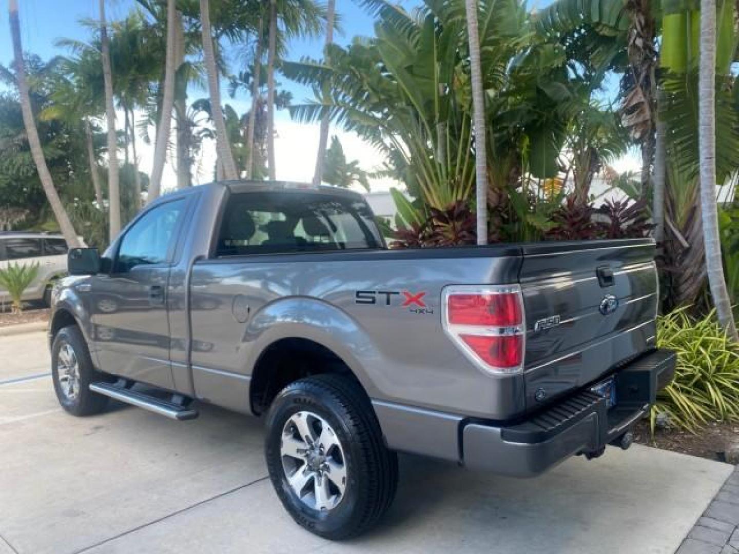 2013 Sterling Gray Metallic /Steel Gray Ford F-150 STX 4WD LOW MILES 27,133 1 OWNER (1FTMF1EF3DF) with an 5.0L V8 FFV Engine engine, Automatic transmission, located at 4701 North Dixie Hwy, Pompano Beach, FL, 33064, (954) 422-2889, 26.240938, -80.123474 - OUR WEBPAGE FLORIDACARS1.COM HAS OVER 100 PHOTOS AND FREE CARFAX LINK 2013 FORD F-150 STX VIN: 1FTMF1EF3DFC39967 1 F T M F 1 E F 3 D F C 3 9 9 6 7 PICKUP 5.0L V8 F DOHC 32V FLEX FUEL REAR WHEEL DRIVE W/ 4X4 Features 4WD/AWD ABS Brakes Air Conditioning Alloy Wheels AM/FM Stereo Automatic Transmission - Photo#34