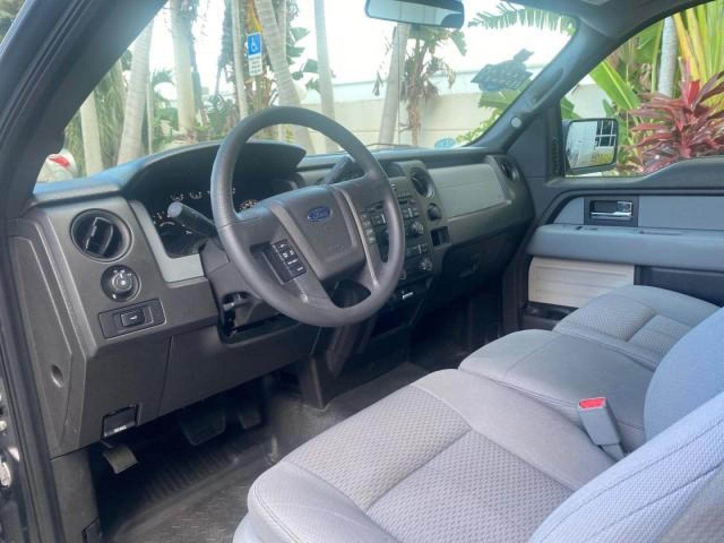 2013 Sterling Gray Metallic /Steel Gray Ford F-150 STX 4WD LOW MILES 27,133 1 OWNER (1FTMF1EF3DF) with an 5.0L V8 FFV Engine engine, Automatic transmission, located at 4701 North Dixie Hwy, Pompano Beach, FL, 33064, (954) 422-2889, 26.240938, -80.123474 - OUR WEBPAGE FLORIDACARS1.COM HAS OVER 100 PHOTOS AND FREE CARFAX LINK 2013 FORD F-150 STX VIN: 1FTMF1EF3DFC39967 1 F T M F 1 E F 3 D F C 3 9 9 6 7 PICKUP 5.0L V8 F DOHC 32V FLEX FUEL REAR WHEEL DRIVE W/ 4X4 Features 4WD/AWD ABS Brakes Air Conditioning Alloy Wheels AM/FM Stereo Automatic Transmission - Photo#49