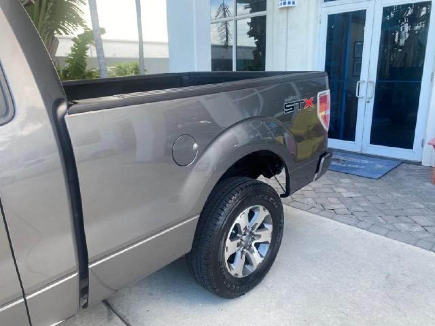 2013 Sterling Gray Metallic /Steel Gray Ford F-150 STX 4WD LOW MILES 27,133 1 OWNER (1FTMF1EF3DF) with an 5.0L V8 FFV Engine engine, Automatic transmission, located at 4701 North Dixie Hwy, Pompano Beach, FL, 33064, (954) 422-2889, 26.240938, -80.123474 - OUR WEBPAGE FLORIDACARS1.COM HAS OVER 100 PHOTOS AND FREE CARFAX LINK 2013 FORD F-150 STX VIN: 1FTMF1EF3DFC39967 1 F T M F 1 E F 3 D F C 3 9 9 6 7 PICKUP 5.0L V8 F DOHC 32V FLEX FUEL REAR WHEEL DRIVE W/ 4X4 Features 4WD/AWD ABS Brakes Air Conditioning Alloy Wheels AM/FM Stereo Automatic Transmission - Photo#76