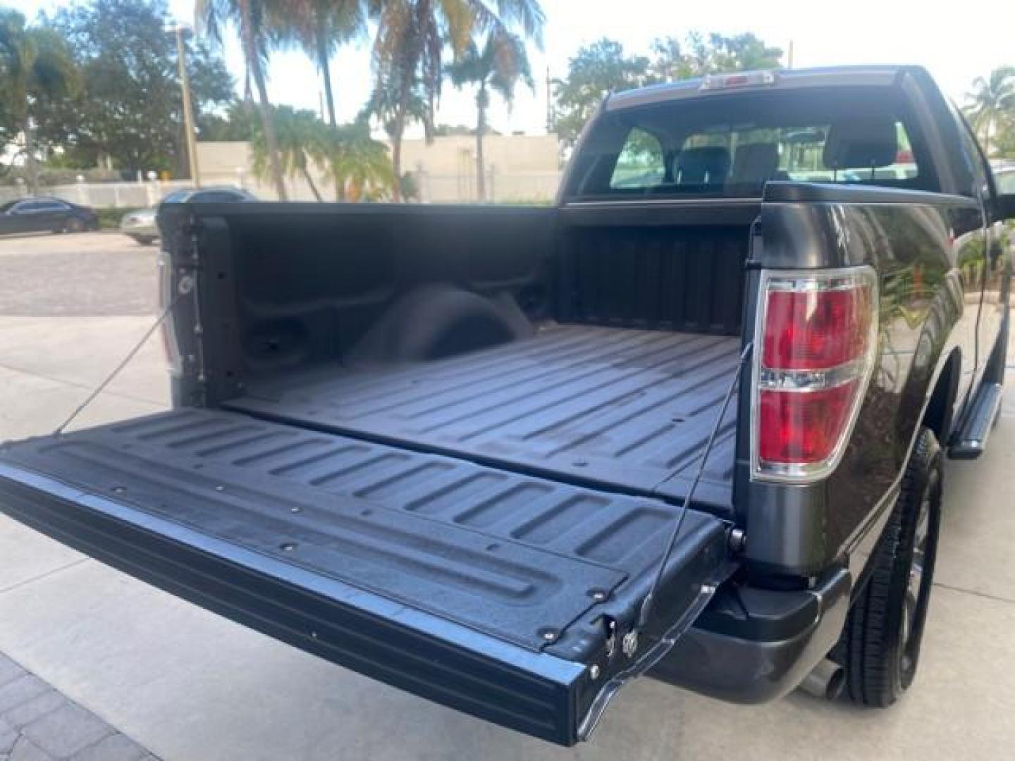 2013 Sterling Gray Metallic /Steel Gray Ford F-150 STX 4WD LOW MILES 27,133 1 OWNER (1FTMF1EF3DF) with an 5.0L V8 FFV Engine engine, Automatic transmission, located at 4701 North Dixie Hwy, Pompano Beach, FL, 33064, (954) 422-2889, 26.240938, -80.123474 - OUR WEBPAGE FLORIDACARS1.COM HAS OVER 100 PHOTOS AND FREE CARFAX LINK 2013 FORD F-150 STX VIN: 1FTMF1EF3DFC39967 1 F T M F 1 E F 3 D F C 3 9 9 6 7 PICKUP 5.0L V8 F DOHC 32V FLEX FUEL REAR WHEEL DRIVE W/ 4X4 Features 4WD/AWD ABS Brakes Air Conditioning Alloy Wheels AM/FM Stereo Automatic Transmission - Photo#96