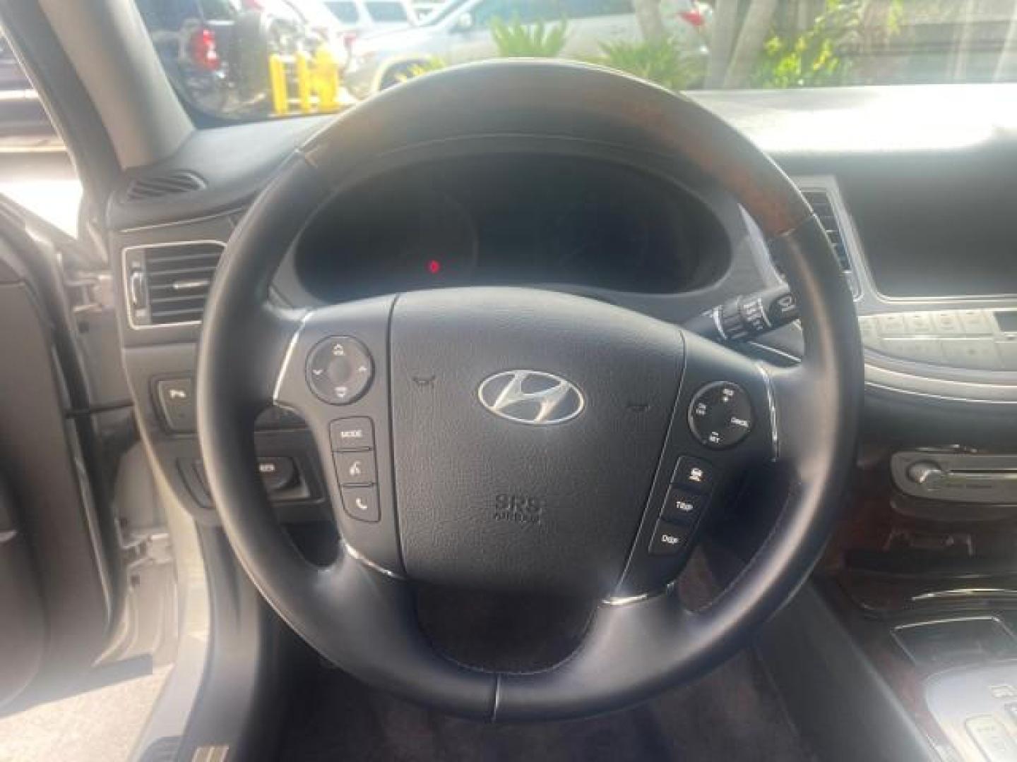 2010 Platinum Metallic /Jet black Hyundai Genesis LOW MILES 32,920 SUNROOF (KMHGC4DF8AU) with an 4.6L DOHC V8 Engine engine, Automatic transmission, located at 4701 North Dixie Hwy, Pompano Beach, FL, 33064, (954) 422-2889, 26.240938, -80.123474 - OUR WEBPAGE FLORIDACARS1.COM HAS OVER 100 PHOTOS AND FREE CARFAX LINK 2010 HYUNDAI GENESIS 4.6L V8 VIN: KMHGC4DF8AU101658 K M H G C 4 D F 8 A U 1 0 1 6 5 8 SEDAN 4 DR 4.6L V8 F DOHC 32V GASOLINE REAR WHEEL DRIVE Features A/C Seat(s) ABS Brakes Air Conditioning Alloy Wheels AM/FM Stereo Automated Cru - Photo#49