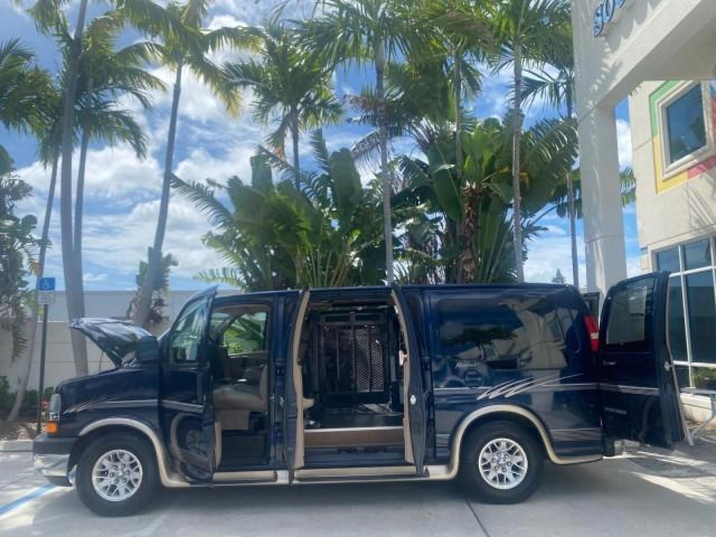 2005 Dark Blue Metallic /Neutral Chevrolet Express Van HANDICAP LIFT CONV LOW MILES 40,837 (1GBFG15T151) with an 5.3L Vortec 5300 V8 SFI Engine engine, Automatic transmission, located at 4701 North Dixie Hwy, Pompano Beach, FL, 33064, (954) 422-2889, 26.240938, -80.123474 - OUR WEBPAGE FLORIDACARS1.COM HAS OVER 100 PHOTOS AND FREE CARFAX LINK 2005 CHEVROLET REGENCY EXPRESS G1500 $20,000 - Conversion Van VIN: 1GBFG15T151226679 $20,000 - Handicap Lift $70,000 - NEW CHEVROLET REGENCY VAN 1 G B F G 1 5 T 1 5 1 2 2 6 6 7 9 VAN 5.3L V8 F GASOLINE REAR WHEEL DRIVE Features AB - Photo#8
