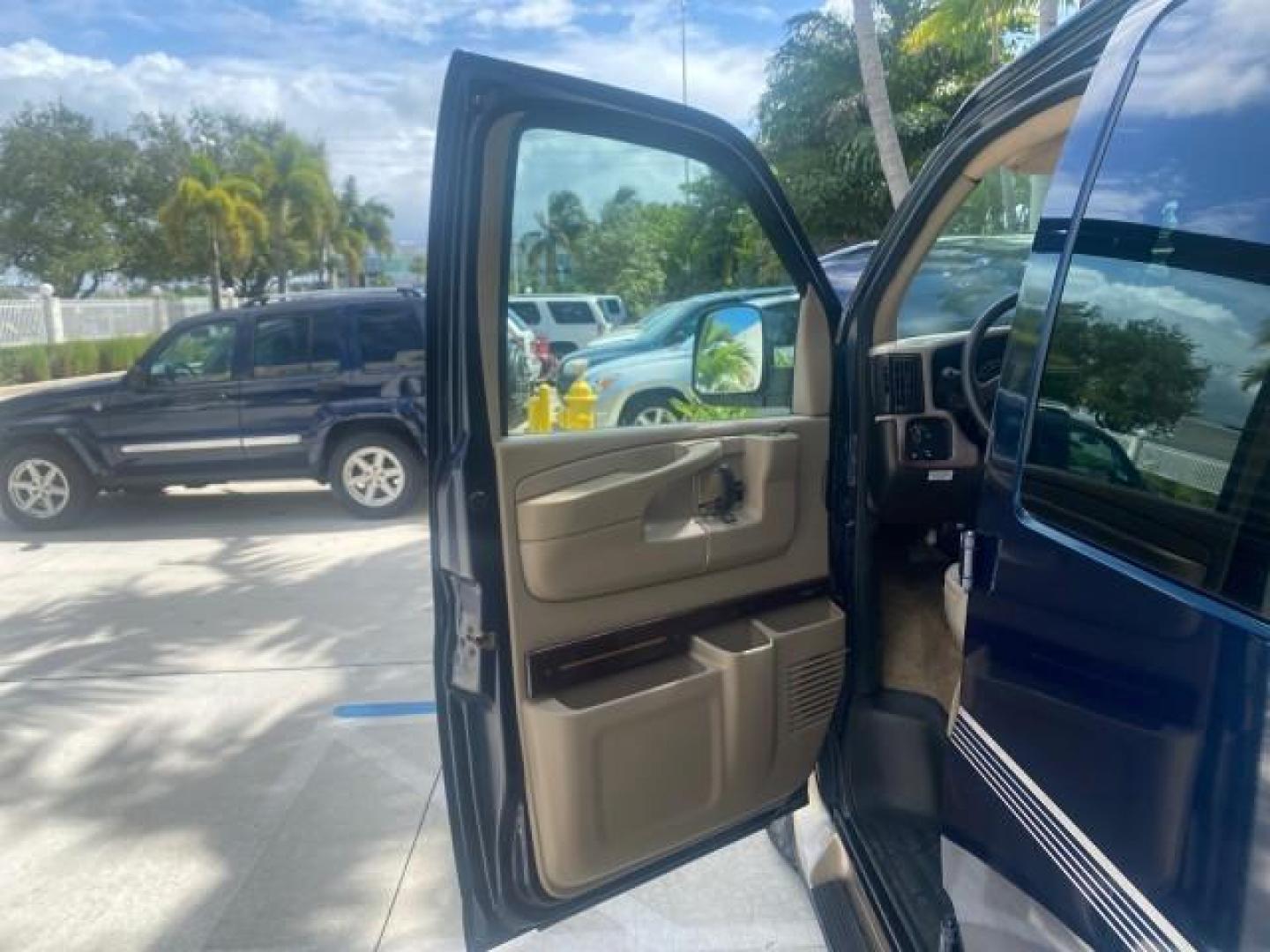 2005 Dark Blue Metallic /Neutral Chevrolet Express Van HANDICAP LIFT CONV LOW MILES 40,837 (1GBFG15T151) with an 5.3L Vortec 5300 V8 SFI Engine engine, Automatic transmission, located at 4701 North Dixie Hwy, Pompano Beach, FL, 33064, (954) 422-2889, 26.240938, -80.123474 - OUR WEBPAGE FLORIDACARS1.COM HAS OVER 100 PHOTOS AND FREE CARFAX LINK 2005 CHEVROLET REGENCY EXPRESS G1500 $20,000 - Conversion Van VIN: 1GBFG15T151226679 $20,000 - Handicap Lift $70,000 - NEW CHEVROLET REGENCY VAN 1 G B F G 1 5 T 1 5 1 2 2 6 6 7 9 VAN 5.3L V8 F GASOLINE REAR WHEEL DRIVE Features AB - Photo#9