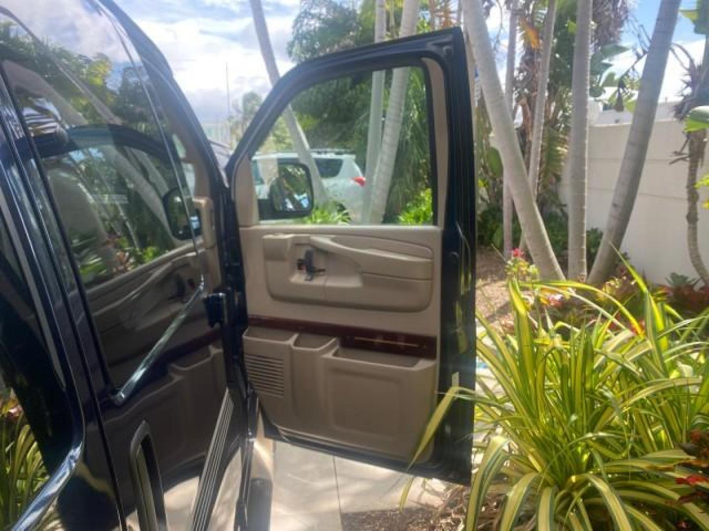 2005 Dark Blue Metallic /Neutral Chevrolet Express Van HANDICAP LIFT CONV LOW MILES 40,837 (1GBFG15T151) with an 5.3L Vortec 5300 V8 SFI Engine engine, Automatic transmission, located at 4701 North Dixie Hwy, Pompano Beach, FL, 33064, (954) 422-2889, 26.240938, -80.123474 - OUR WEBPAGE FLORIDACARS1.COM HAS OVER 100 PHOTOS AND FREE CARFAX LINK 2005 CHEVROLET REGENCY EXPRESS G1500 $20,000 - Conversion Van VIN: 1GBFG15T151226679 $20,000 - Handicap Lift $70,000 - NEW CHEVROLET REGENCY VAN 1 G B F G 1 5 T 1 5 1 2 2 6 6 7 9 VAN 5.3L V8 F GASOLINE REAR WHEEL DRIVE Features AB - Photo#11