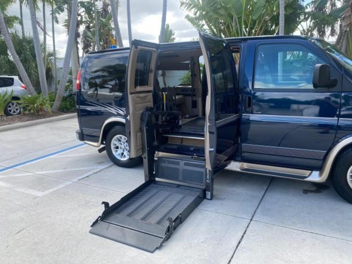 2005 Dark Blue Metallic /Neutral Chevrolet Express Van HANDICAP LIFT CONV LOW MILES 40,837 (1GBFG15T151) with an 5.3L Vortec 5300 V8 SFI Engine engine, Automatic transmission, located at 4701 North Dixie Hwy, Pompano Beach, FL, 33064, (954) 422-2889, 26.240938, -80.123474 - OUR WEBPAGE FLORIDACARS1.COM HAS OVER 100 PHOTOS AND FREE CARFAX LINK 2005 CHEVROLET REGENCY EXPRESS G1500 $20,000 - Conversion Van VIN: 1GBFG15T151226679 $20,000 - Handicap Lift $70,000 - NEW CHEVROLET REGENCY VAN 1 G B F G 1 5 T 1 5 1 2 2 6 6 7 9 VAN 5.3L V8 F GASOLINE REAR WHEEL DRIVE Features AB - Photo#26