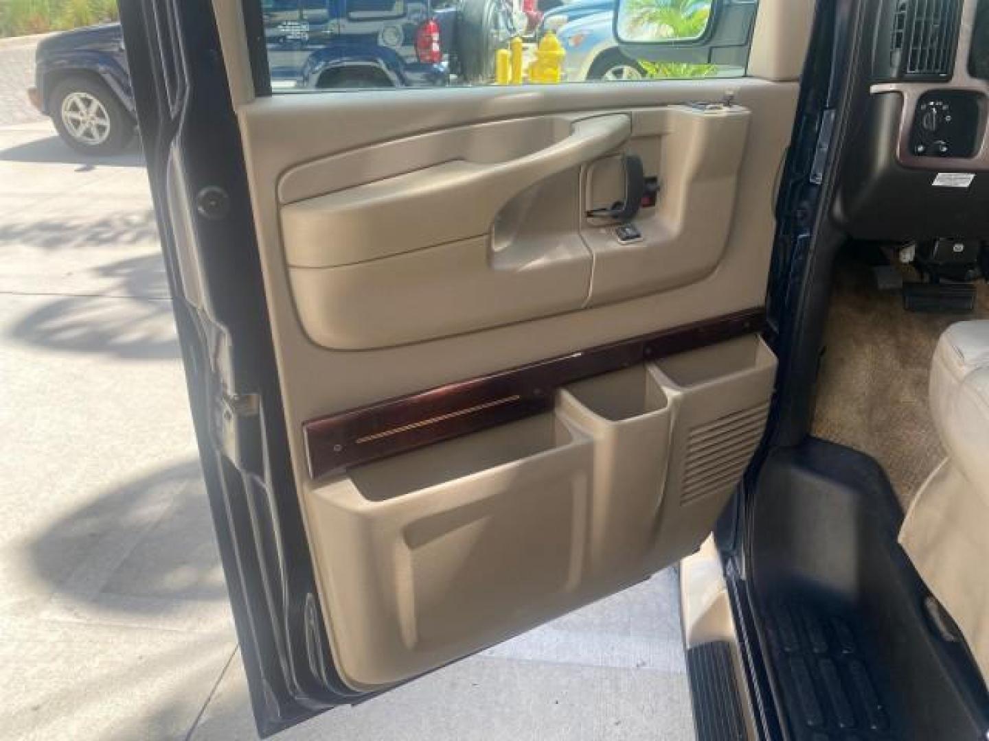 2005 Dark Blue Metallic /Neutral Chevrolet Express Van HANDICAP LIFT CONV LOW MILES 40,837 (1GBFG15T151) with an 5.3L Vortec 5300 V8 SFI Engine engine, Automatic transmission, located at 4701 North Dixie Hwy, Pompano Beach, FL, 33064, (954) 422-2889, 26.240938, -80.123474 - OUR WEBPAGE FLORIDACARS1.COM HAS OVER 100 PHOTOS AND FREE CARFAX LINK 2005 CHEVROLET REGENCY EXPRESS G1500 $20,000 - Conversion Van VIN: 1GBFG15T151226679 $20,000 - Handicap Lift $70,000 - NEW CHEVROLET REGENCY VAN 1 G B F G 1 5 T 1 5 1 2 2 6 6 7 9 VAN 5.3L V8 F GASOLINE REAR WHEEL DRIVE Features AB - Photo#43
