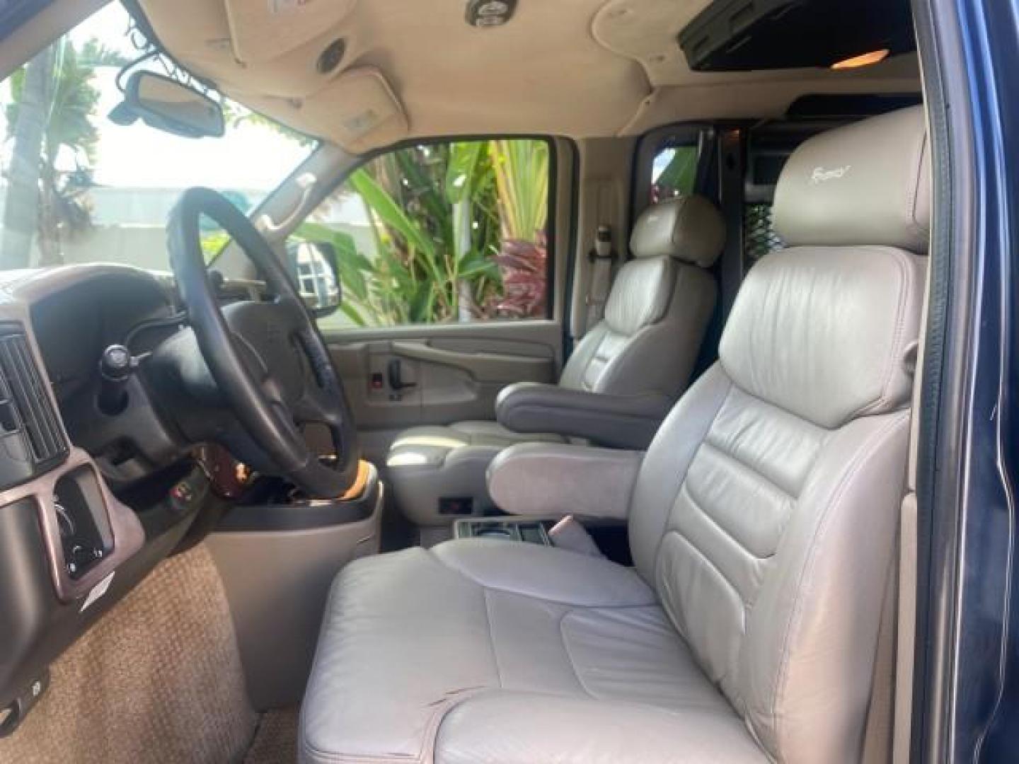 2005 Dark Blue Metallic /Neutral Chevrolet Express Van HANDICAP LIFT CONV LOW MILES 40,837 (1GBFG15T151) with an 5.3L Vortec 5300 V8 SFI Engine engine, Automatic transmission, located at 4701 North Dixie Hwy, Pompano Beach, FL, 33064, (954) 422-2889, 26.240938, -80.123474 - OUR WEBPAGE FLORIDACARS1.COM HAS OVER 100 PHOTOS AND FREE CARFAX LINK 2005 CHEVROLET REGENCY EXPRESS G1500 $20,000 - Conversion Van VIN: 1GBFG15T151226679 $20,000 - Handicap Lift $70,000 - NEW CHEVROLET REGENCY VAN 1 G B F G 1 5 T 1 5 1 2 2 6 6 7 9 VAN 5.3L V8 F GASOLINE REAR WHEEL DRIVE Features AB - Photo#44