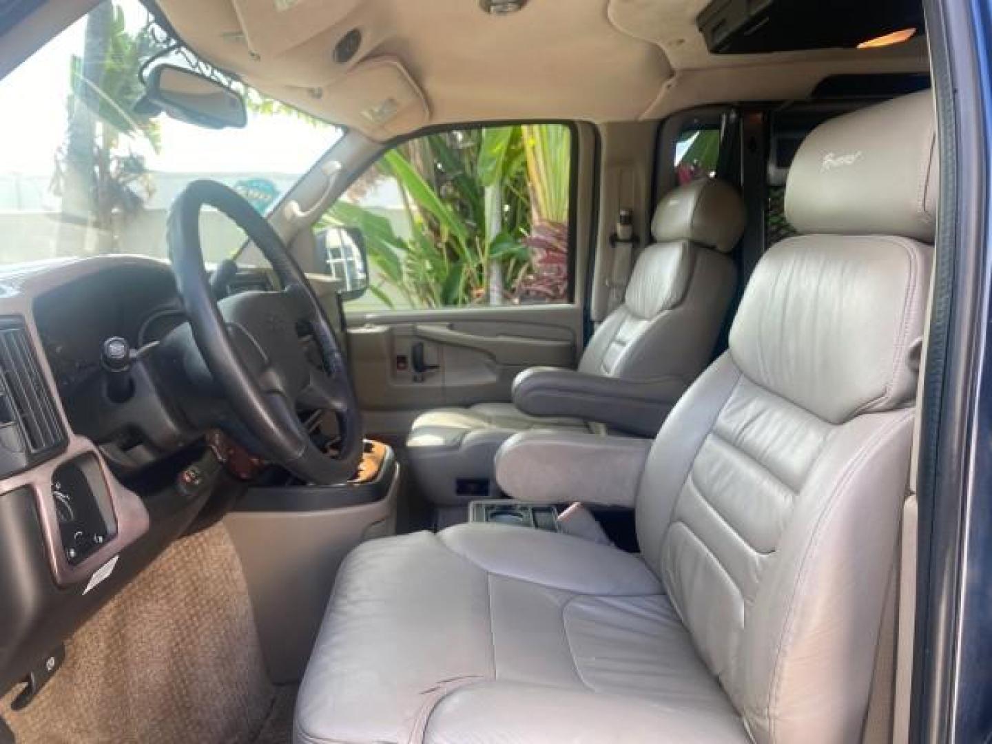 2005 Dark Blue Metallic /Neutral Chevrolet Express Van HANDICAP LIFT CONV LOW MILES 40,837 (1GBFG15T151) with an 5.3L Vortec 5300 V8 SFI Engine engine, Automatic transmission, located at 4701 North Dixie Hwy, Pompano Beach, FL, 33064, (954) 422-2889, 26.240938, -80.123474 - OUR WEBPAGE FLORIDACARS1.COM HAS OVER 100 PHOTOS AND FREE CARFAX LINK 2005 CHEVROLET REGENCY EXPRESS G1500 $20,000 - Conversion Van VIN: 1GBFG15T151226679 $20,000 - Handicap Lift $70,000 - NEW CHEVROLET REGENCY VAN 1 G B F G 1 5 T 1 5 1 2 2 6 6 7 9 VAN 5.3L V8 F GASOLINE REAR WHEEL DRIVE Features AB - Photo#45