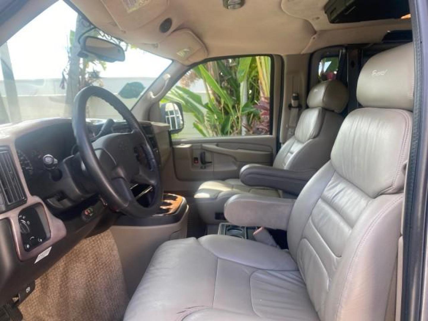 2005 Dark Blue Metallic /Neutral Chevrolet Express Van HANDICAP LIFT CONV LOW MILES 40,837 (1GBFG15T151) with an 5.3L Vortec 5300 V8 SFI Engine engine, Automatic transmission, located at 4701 North Dixie Hwy, Pompano Beach, FL, 33064, (954) 422-2889, 26.240938, -80.123474 - OUR WEBPAGE FLORIDACARS1.COM HAS OVER 100 PHOTOS AND FREE CARFAX LINK 2005 CHEVROLET REGENCY EXPRESS G1500 $20,000 - Conversion Van VIN: 1GBFG15T151226679 $20,000 - Handicap Lift $70,000 - NEW CHEVROLET REGENCY VAN 1 G B F G 1 5 T 1 5 1 2 2 6 6 7 9 VAN 5.3L V8 F GASOLINE REAR WHEEL DRIVE Features AB - Photo#46