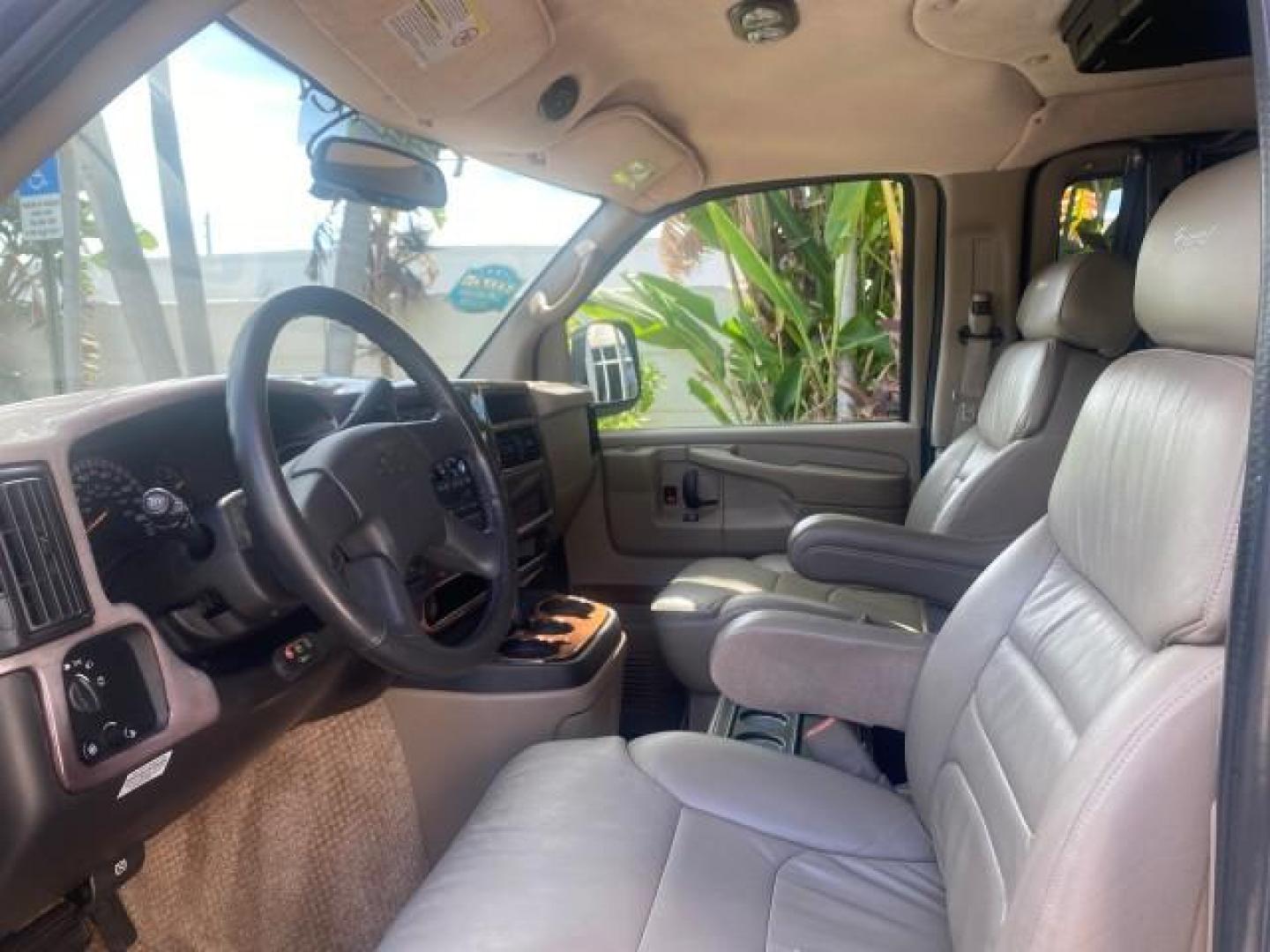 2005 Dark Blue Metallic /Neutral Chevrolet Express Van HANDICAP LIFT CONV LOW MILES 40,837 (1GBFG15T151) with an 5.3L Vortec 5300 V8 SFI Engine engine, Automatic transmission, located at 4701 North Dixie Hwy, Pompano Beach, FL, 33064, (954) 422-2889, 26.240938, -80.123474 - OUR WEBPAGE FLORIDACARS1.COM HAS OVER 100 PHOTOS AND FREE CARFAX LINK 2005 CHEVROLET REGENCY EXPRESS G1500 $20,000 - Conversion Van VIN: 1GBFG15T151226679 $20,000 - Handicap Lift $70,000 - NEW CHEVROLET REGENCY VAN 1 G B F G 1 5 T 1 5 1 2 2 6 6 7 9 VAN 5.3L V8 F GASOLINE REAR WHEEL DRIVE Features AB - Photo#47