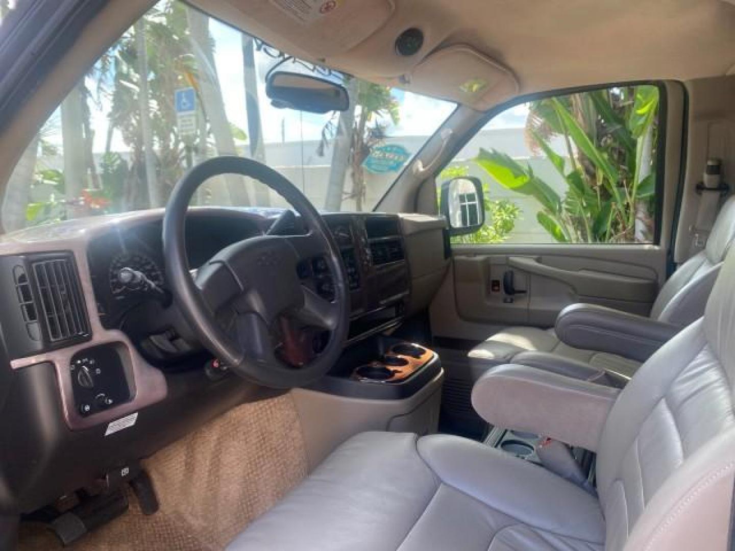 2005 Dark Blue Metallic /Neutral Chevrolet Express Van HANDICAP LIFT CONV LOW MILES 40,837 (1GBFG15T151) with an 5.3L Vortec 5300 V8 SFI Engine engine, Automatic transmission, located at 4701 North Dixie Hwy, Pompano Beach, FL, 33064, (954) 422-2889, 26.240938, -80.123474 - OUR WEBPAGE FLORIDACARS1.COM HAS OVER 100 PHOTOS AND FREE CARFAX LINK 2005 CHEVROLET REGENCY EXPRESS G1500 $20,000 - Conversion Van VIN: 1GBFG15T151226679 $20,000 - Handicap Lift $70,000 - NEW CHEVROLET REGENCY VAN 1 G B F G 1 5 T 1 5 1 2 2 6 6 7 9 VAN 5.3L V8 F GASOLINE REAR WHEEL DRIVE Features AB - Photo#48