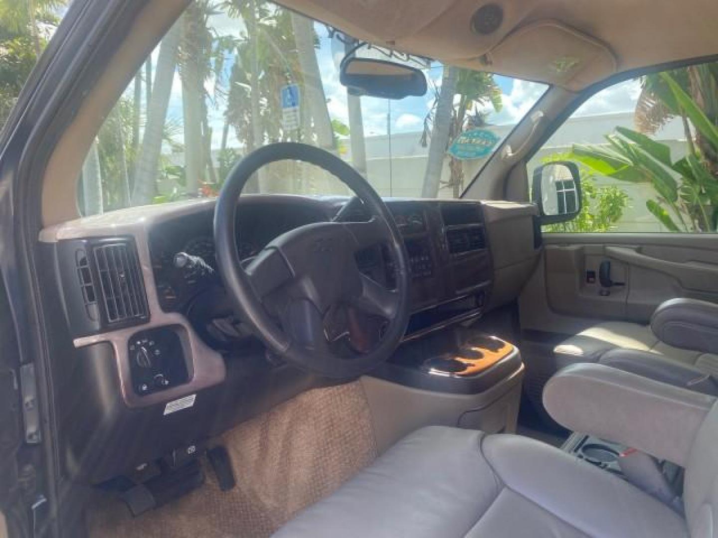 2005 Dark Blue Metallic /Neutral Chevrolet Express Van HANDICAP LIFT CONV LOW MILES 40,837 (1GBFG15T151) with an 5.3L Vortec 5300 V8 SFI Engine engine, Automatic transmission, located at 4701 North Dixie Hwy, Pompano Beach, FL, 33064, (954) 422-2889, 26.240938, -80.123474 - OUR WEBPAGE FLORIDACARS1.COM HAS OVER 100 PHOTOS AND FREE CARFAX LINK 2005 CHEVROLET REGENCY EXPRESS G1500 $20,000 - Conversion Van VIN: 1GBFG15T151226679 $20,000 - Handicap Lift $70,000 - NEW CHEVROLET REGENCY VAN 1 G B F G 1 5 T 1 5 1 2 2 6 6 7 9 VAN 5.3L V8 F GASOLINE REAR WHEEL DRIVE Features AB - Photo#49