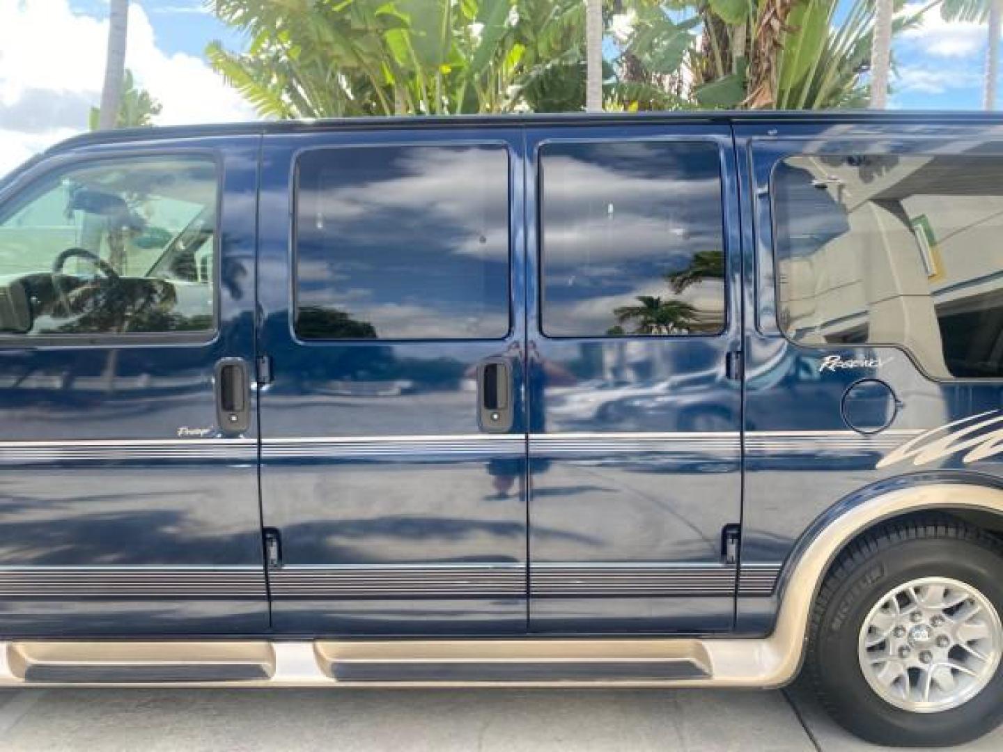 2005 Dark Blue Metallic /Neutral Chevrolet Express Van HANDICAP LIFT CONV LOW MILES 40,837 (1GBFG15T151) with an 5.3L Vortec 5300 V8 SFI Engine engine, Automatic transmission, located at 4701 North Dixie Hwy, Pompano Beach, FL, 33064, (954) 422-2889, 26.240938, -80.123474 - OUR WEBPAGE FLORIDACARS1.COM HAS OVER 100 PHOTOS AND FREE CARFAX LINK 2005 CHEVROLET REGENCY EXPRESS G1500 $20,000 - Conversion Van VIN: 1GBFG15T151226679 $20,000 - Handicap Lift $70,000 - NEW CHEVROLET REGENCY VAN 1 G B F G 1 5 T 1 5 1 2 2 6 6 7 9 VAN 5.3L V8 F GASOLINE REAR WHEEL DRIVE Features AB - Photo#71