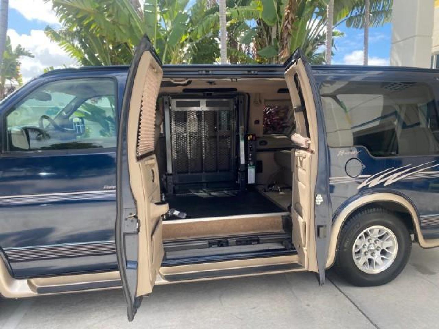 2005 Dark Blue Metallic /Neutral Chevrolet Express Van HANDICAP LIFT CONV LOW MILES 40,837 (1GBFG15T151) with an 5.3L Vortec 5300 V8 SFI Engine engine, Automatic transmission, located at 4701 North Dixie Hwy, Pompano Beach, FL, 33064, (954) 422-2889, 26.240938, -80.123474 - OUR WEBPAGE FLORIDACARS1.COM HAS OVER 100 PHOTOS AND FREE CARFAX LINK 2005 CHEVROLET REGENCY EXPRESS G1500 $20,000 - Conversion Van VIN: 1GBFG15T151226679 $20,000 - Handicap Lift $70,000 - NEW CHEVROLET REGENCY VAN 1 G B F G 1 5 T 1 5 1 2 2 6 6 7 9 VAN 5.3L V8 F GASOLINE REAR WHEEL DRIVE Features AB - Photo#73
