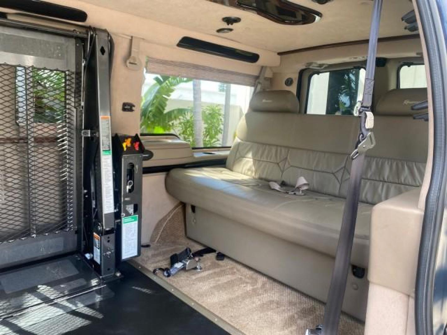 2005 Dark Blue Metallic /Neutral Chevrolet Express Van HANDICAP LIFT CONV LOW MILES 40,837 (1GBFG15T151) with an 5.3L Vortec 5300 V8 SFI Engine engine, Automatic transmission, located at 4701 North Dixie Hwy, Pompano Beach, FL, 33064, (954) 422-2889, 26.240938, -80.123474 - OUR WEBPAGE FLORIDACARS1.COM HAS OVER 100 PHOTOS AND FREE CARFAX LINK 2005 CHEVROLET REGENCY EXPRESS G1500 $20,000 - Conversion Van VIN: 1GBFG15T151226679 $20,000 - Handicap Lift $70,000 - NEW CHEVROLET REGENCY VAN 1 G B F G 1 5 T 1 5 1 2 2 6 6 7 9 VAN 5.3L V8 F GASOLINE REAR WHEEL DRIVE Features AB - Photo#77