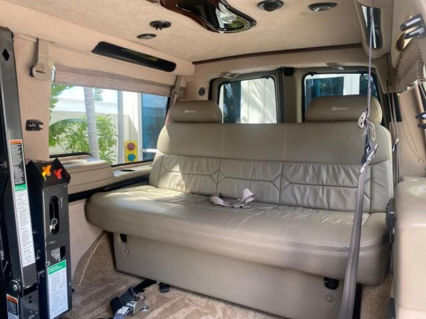 2005 Dark Blue Metallic /Neutral Chevrolet Express Van HANDICAP LIFT CONV LOW MILES 40,837 (1GBFG15T151) with an 5.3L Vortec 5300 V8 SFI Engine engine, Automatic transmission, located at 4701 North Dixie Hwy, Pompano Beach, FL, 33064, (954) 422-2889, 26.240938, -80.123474 - OUR WEBPAGE FLORIDACARS1.COM HAS OVER 100 PHOTOS AND FREE CARFAX LINK 2005 CHEVROLET REGENCY EXPRESS G1500 $20,000 - Conversion Van VIN: 1GBFG15T151226679 $20,000 - Handicap Lift $70,000 - NEW CHEVROLET REGENCY VAN 1 G B F G 1 5 T 1 5 1 2 2 6 6 7 9 VAN 5.3L V8 F GASOLINE REAR WHEEL DRIVE Features AB - Photo#78