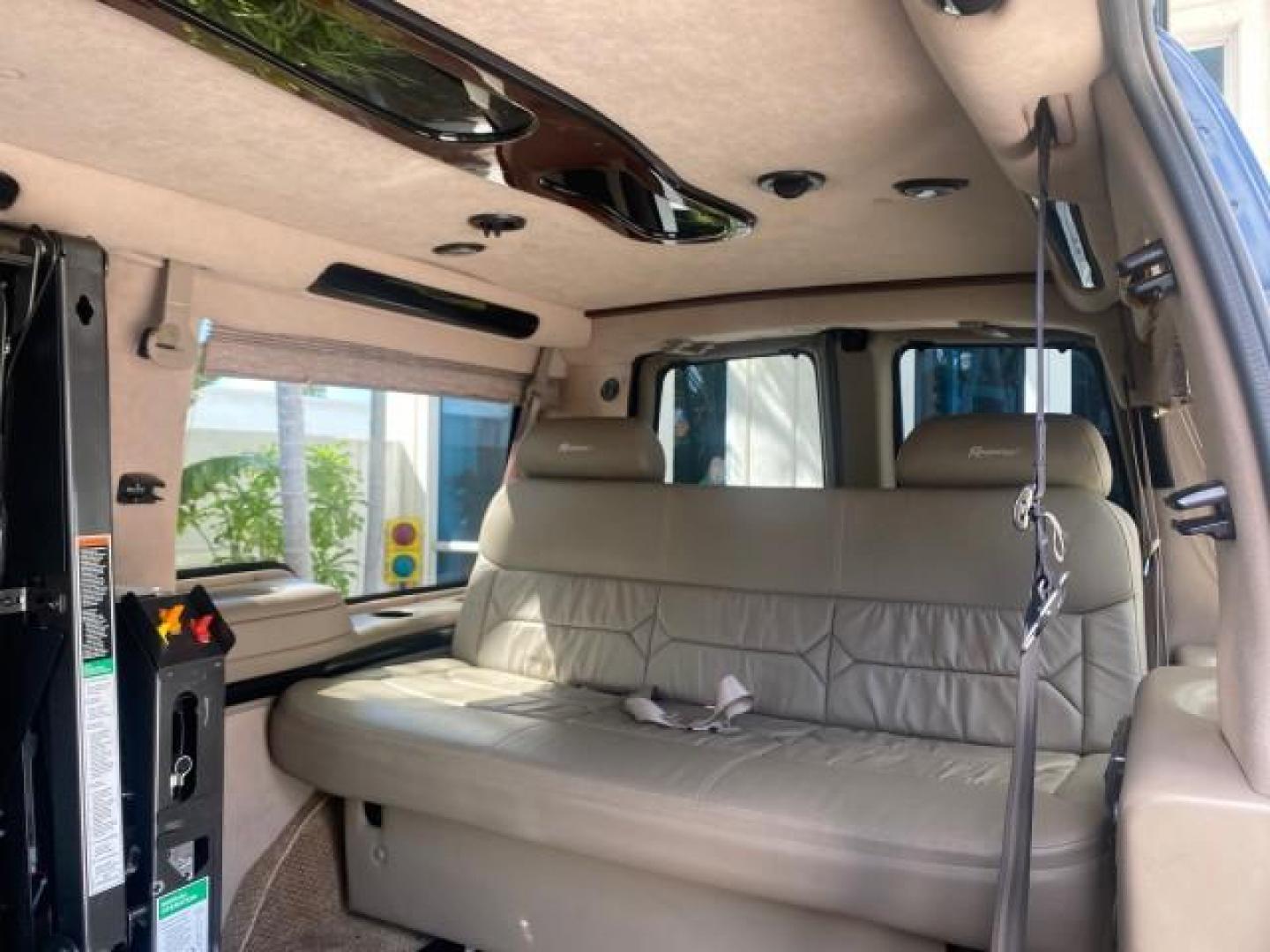 2005 Dark Blue Metallic /Neutral Chevrolet Express Van HANDICAP LIFT CONV LOW MILES 40,837 (1GBFG15T151) with an 5.3L Vortec 5300 V8 SFI Engine engine, Automatic transmission, located at 4701 North Dixie Hwy, Pompano Beach, FL, 33064, (954) 422-2889, 26.240938, -80.123474 - OUR WEBPAGE FLORIDACARS1.COM HAS OVER 100 PHOTOS AND FREE CARFAX LINK 2005 CHEVROLET REGENCY EXPRESS G1500 $20,000 - Conversion Van VIN: 1GBFG15T151226679 $20,000 - Handicap Lift $70,000 - NEW CHEVROLET REGENCY VAN 1 G B F G 1 5 T 1 5 1 2 2 6 6 7 9 VAN 5.3L V8 F GASOLINE REAR WHEEL DRIVE Features AB - Photo#79