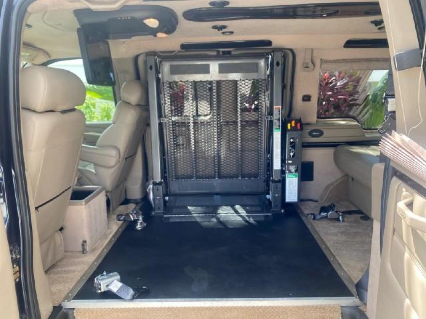 2005 Dark Blue Metallic /Neutral Chevrolet Express Van HANDICAP LIFT CONV LOW MILES 40,837 (1GBFG15T151) with an 5.3L Vortec 5300 V8 SFI Engine engine, Automatic transmission, located at 4701 North Dixie Hwy, Pompano Beach, FL, 33064, (954) 422-2889, 26.240938, -80.123474 - OUR WEBPAGE FLORIDACARS1.COM HAS OVER 100 PHOTOS AND FREE CARFAX LINK 2005 CHEVROLET REGENCY EXPRESS G1500 $20,000 - Conversion Van VIN: 1GBFG15T151226679 $20,000 - Handicap Lift $70,000 - NEW CHEVROLET REGENCY VAN 1 G B F G 1 5 T 1 5 1 2 2 6 6 7 9 VAN 5.3L V8 F GASOLINE REAR WHEEL DRIVE Features AB - Photo#80