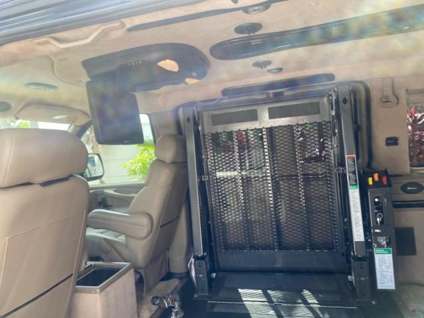 2005 Dark Blue Metallic /Neutral Chevrolet Express Van HANDICAP LIFT CONV LOW MILES 40,837 (1GBFG15T151) with an 5.3L Vortec 5300 V8 SFI Engine engine, Automatic transmission, located at 4701 North Dixie Hwy, Pompano Beach, FL, 33064, (954) 422-2889, 26.240938, -80.123474 - OUR WEBPAGE FLORIDACARS1.COM HAS OVER 100 PHOTOS AND FREE CARFAX LINK 2005 CHEVROLET REGENCY EXPRESS G1500 $20,000 - Conversion Van VIN: 1GBFG15T151226679 $20,000 - Handicap Lift $70,000 - NEW CHEVROLET REGENCY VAN 1 G B F G 1 5 T 1 5 1 2 2 6 6 7 9 VAN 5.3L V8 F GASOLINE REAR WHEEL DRIVE Features AB - Photo#81