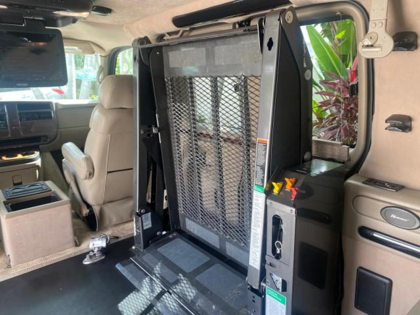 2005 Dark Blue Metallic /Neutral Chevrolet Express Van HANDICAP LIFT CONV LOW MILES 40,837 (1GBFG15T151) with an 5.3L Vortec 5300 V8 SFI Engine engine, Automatic transmission, located at 4701 North Dixie Hwy, Pompano Beach, FL, 33064, (954) 422-2889, 26.240938, -80.123474 - OUR WEBPAGE FLORIDACARS1.COM HAS OVER 100 PHOTOS AND FREE CARFAX LINK 2005 CHEVROLET REGENCY EXPRESS G1500 $20,000 - Conversion Van VIN: 1GBFG15T151226679 $20,000 - Handicap Lift $70,000 - NEW CHEVROLET REGENCY VAN 1 G B F G 1 5 T 1 5 1 2 2 6 6 7 9 VAN 5.3L V8 F GASOLINE REAR WHEEL DRIVE Features AB - Photo#83