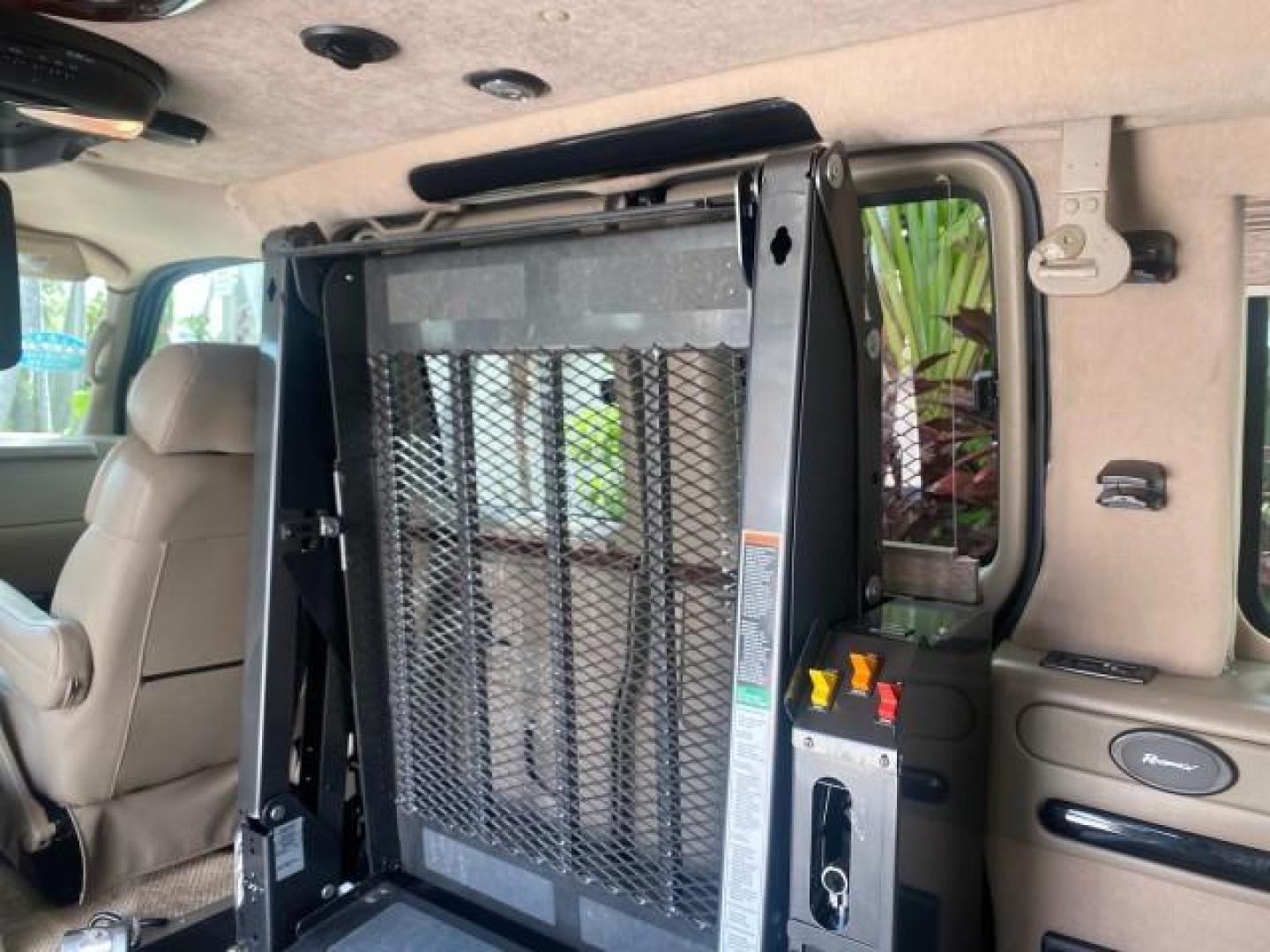 2005 Dark Blue Metallic /Neutral Chevrolet Express Van HANDICAP LIFT CONV LOW MILES 40,837 (1GBFG15T151) with an 5.3L Vortec 5300 V8 SFI Engine engine, Automatic transmission, located at 4701 North Dixie Hwy, Pompano Beach, FL, 33064, (954) 422-2889, 26.240938, -80.123474 - OUR WEBPAGE FLORIDACARS1.COM HAS OVER 100 PHOTOS AND FREE CARFAX LINK 2005 CHEVROLET REGENCY EXPRESS G1500 $20,000 - Conversion Van VIN: 1GBFG15T151226679 $20,000 - Handicap Lift $70,000 - NEW CHEVROLET REGENCY VAN 1 G B F G 1 5 T 1 5 1 2 2 6 6 7 9 VAN 5.3L V8 F GASOLINE REAR WHEEL DRIVE Features AB - Photo#84