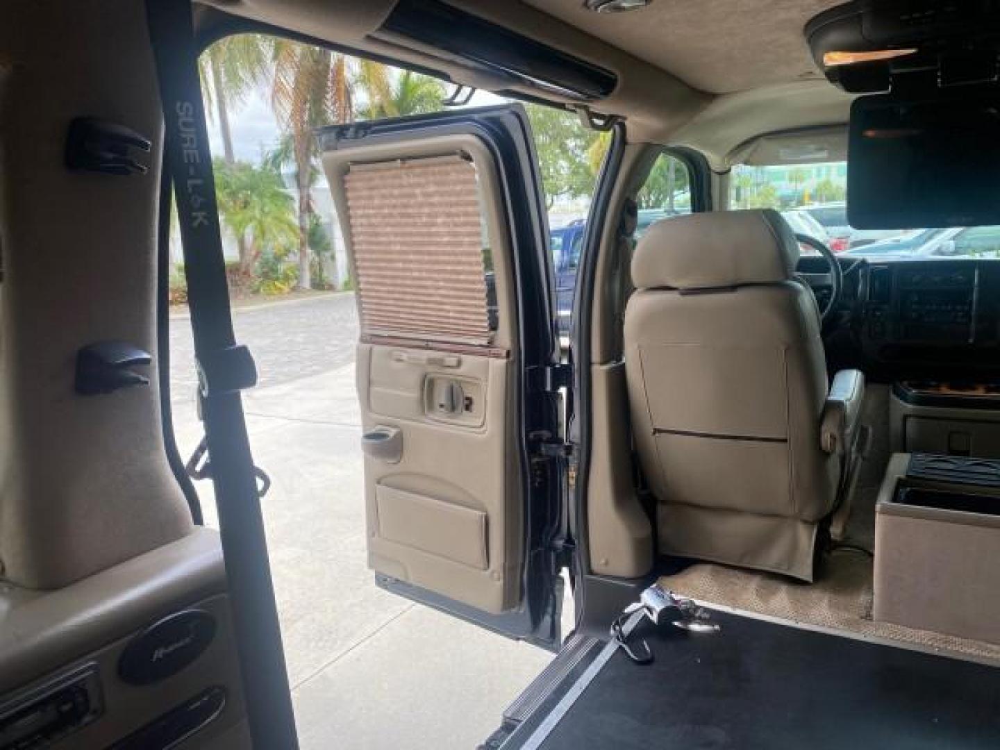 2005 Dark Blue Metallic /Neutral Chevrolet Express Van HANDICAP LIFT CONV LOW MILES 40,837 (1GBFG15T151) with an 5.3L Vortec 5300 V8 SFI Engine engine, Automatic transmission, located at 4701 North Dixie Hwy, Pompano Beach, FL, 33064, (954) 422-2889, 26.240938, -80.123474 - OUR WEBPAGE FLORIDACARS1.COM HAS OVER 100 PHOTOS AND FREE CARFAX LINK 2005 CHEVROLET REGENCY EXPRESS G1500 $20,000 - Conversion Van VIN: 1GBFG15T151226679 $20,000 - Handicap Lift $70,000 - NEW CHEVROLET REGENCY VAN 1 G B F G 1 5 T 1 5 1 2 2 6 6 7 9 VAN 5.3L V8 F GASOLINE REAR WHEEL DRIVE Features AB - Photo#90