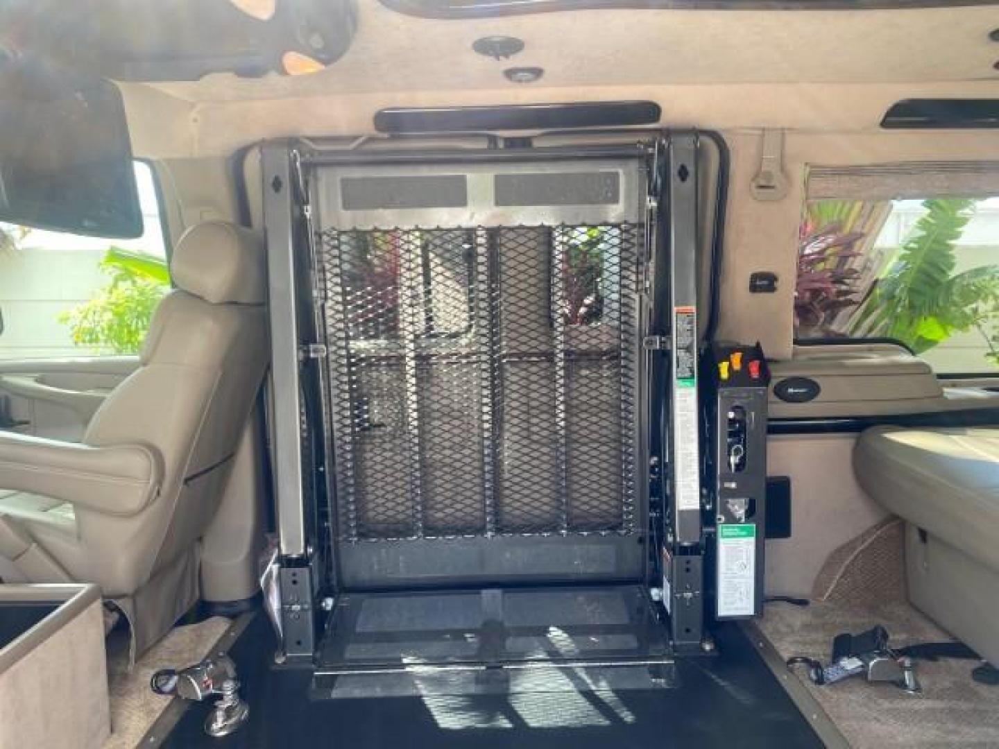 2005 Dark Blue Metallic /Neutral Chevrolet Express Van HANDICAP LIFT CONV LOW MILES 40,837 (1GBFG15T151) with an 5.3L Vortec 5300 V8 SFI Engine engine, Automatic transmission, located at 4701 North Dixie Hwy, Pompano Beach, FL, 33064, (954) 422-2889, 26.240938, -80.123474 - OUR WEBPAGE FLORIDACARS1.COM HAS OVER 100 PHOTOS AND FREE CARFAX LINK 2005 CHEVROLET REGENCY EXPRESS G1500 $20,000 - Conversion Van VIN: 1GBFG15T151226679 $20,000 - Handicap Lift $70,000 - NEW CHEVROLET REGENCY VAN 1 G B F G 1 5 T 1 5 1 2 2 6 6 7 9 VAN 5.3L V8 F GASOLINE REAR WHEEL DRIVE Features AB - Photo#93