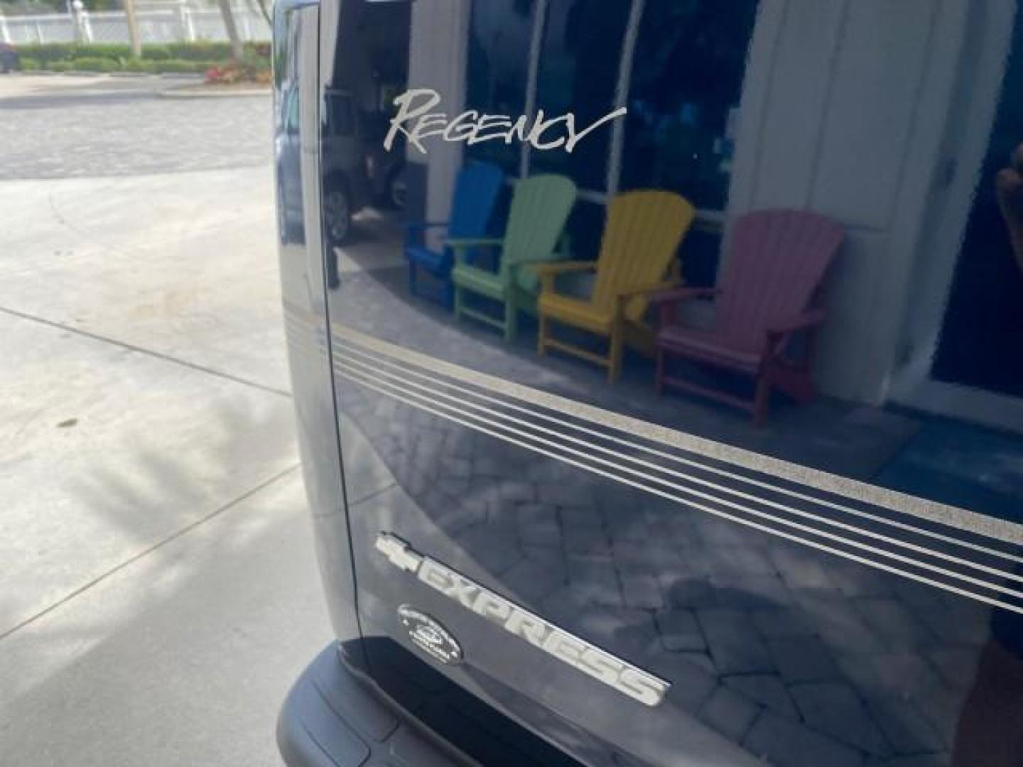 2005 Dark Blue Metallic /Neutral Chevrolet Express Van HANDICAP LIFT CONV LOW MILES 40,837 (1GBFG15T151) with an 5.3L Vortec 5300 V8 SFI Engine engine, Automatic transmission, located at 4701 North Dixie Hwy, Pompano Beach, FL, 33064, (954) 422-2889, 26.240938, -80.123474 - OUR WEBPAGE FLORIDACARS1.COM HAS OVER 100 PHOTOS AND FREE CARFAX LINK 2005 CHEVROLET REGENCY EXPRESS G1500 $20,000 - Conversion Van VIN: 1GBFG15T151226679 $20,000 - Handicap Lift $70,000 - NEW CHEVROLET REGENCY VAN 1 G B F G 1 5 T 1 5 1 2 2 6 6 7 9 VAN 5.3L V8 F GASOLINE REAR WHEEL DRIVE Features AB - Photo#98