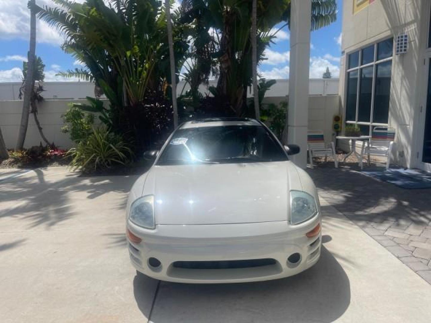 2004 Dover White Pearl /Midnight Mitsubishi Eclipse AUTO GS LOW MILES 57,084 (4A3AC44G24E) with an 2.4L SOHC MPFI 16-Valve I4 Engine engine, Automatic transmission, located at 4701 North Dixie Hwy, Pompano Beach, FL, 33064, (954) 422-2889, 26.240938, -80.123474 - OUR WEBPAGE FLORIDACARS1.COM HAS OVER 100 PHOTOS AND FREE CARFAX LINK 2004 MITSUBISHI ECLIPSE GS VIN: 4A3AC44G24E061723 4 A 3 A C 4 4 G 2 4 E 0 6 1 7 2 3 HATCHBACK 2 DR 2.4L I4 F GASOLINE FRONT WHEEL DRIVE Features Air Conditioning Alloy Wheels AM/FM Stereo Automatic Transmission CD Audio Cloth Seat - Photo#2