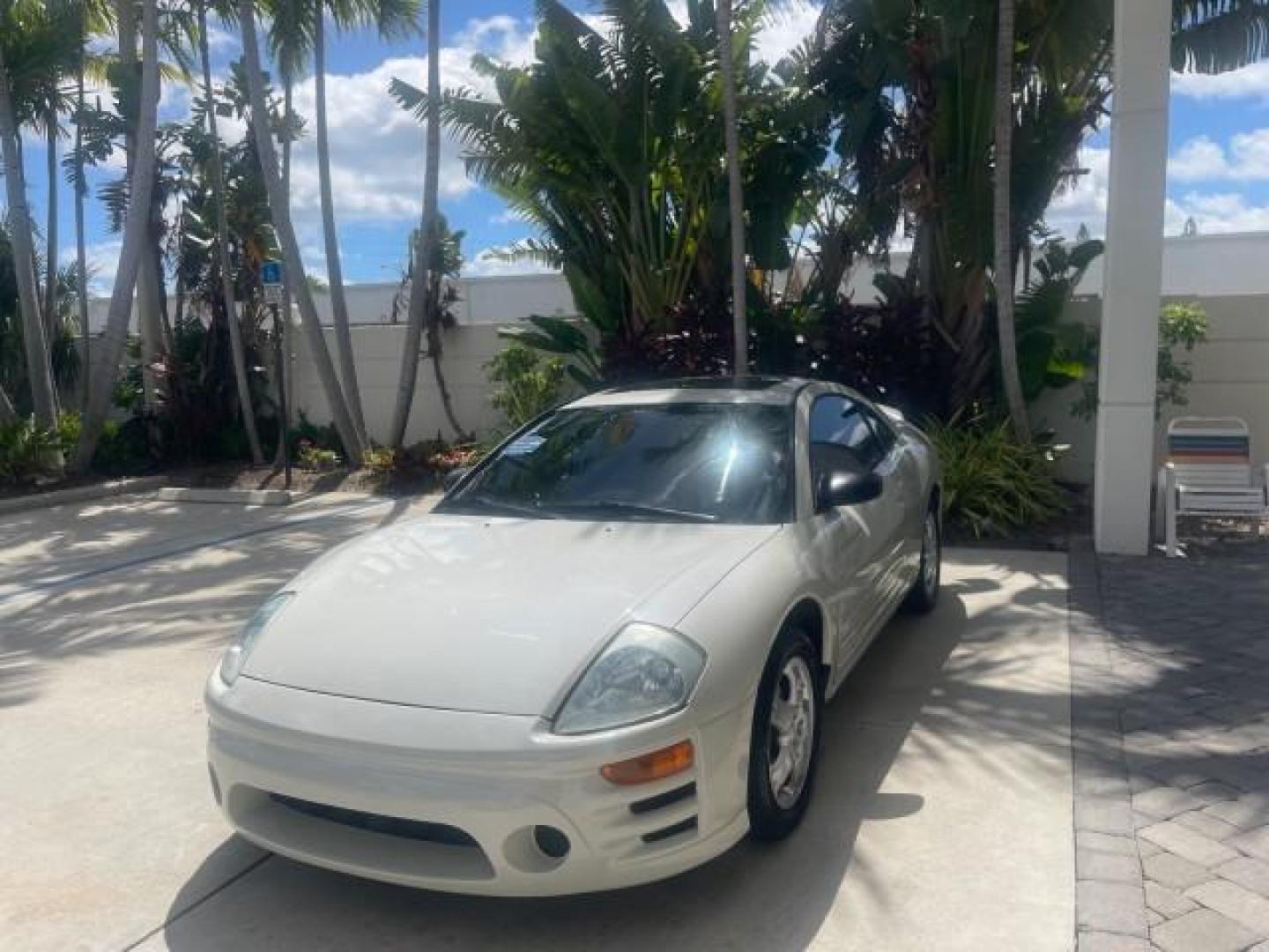 2004 Dover White Pearl /Midnight Mitsubishi Eclipse AUTO GS LOW MILES 57,084 (4A3AC44G24E) with an 2.4L SOHC MPFI 16-Valve I4 Engine engine, Automatic transmission, located at 4701 North Dixie Hwy, Pompano Beach, FL, 33064, (954) 422-2889, 26.240938, -80.123474 - OUR WEBPAGE FLORIDACARS1.COM HAS OVER 100 PHOTOS AND FREE CARFAX LINK 2004 MITSUBISHI ECLIPSE GS VIN: 4A3AC44G24E061723 4 A 3 A C 4 4 G 2 4 E 0 6 1 7 2 3 HATCHBACK 2 DR 2.4L I4 F GASOLINE FRONT WHEEL DRIVE Features Air Conditioning Alloy Wheels AM/FM Stereo Automatic Transmission CD Audio Cloth Seat - Photo#3