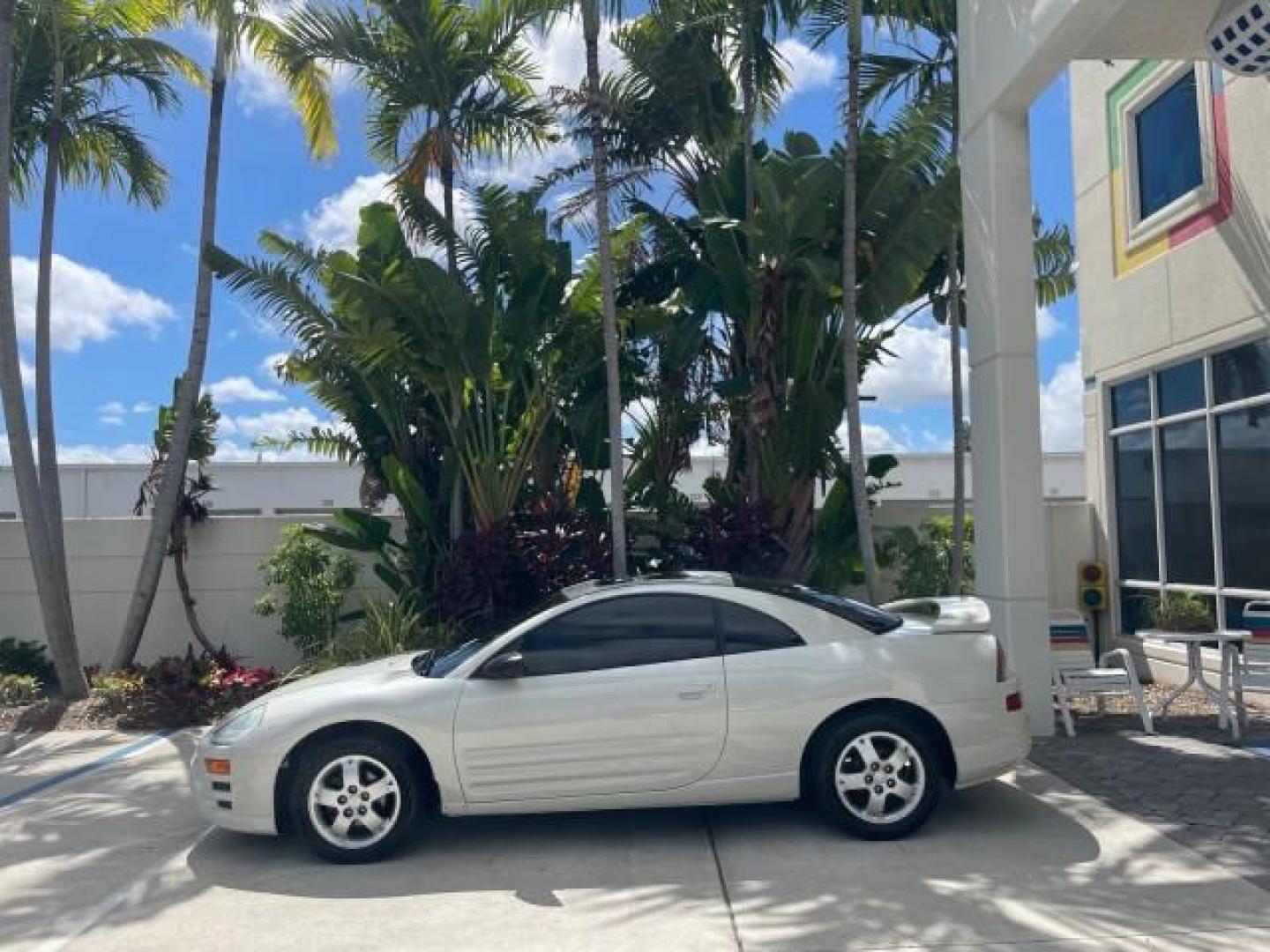 2004 Dover White Pearl /Midnight Mitsubishi Eclipse AUTO GS LOW MILES 57,084 (4A3AC44G24E) with an 2.4L SOHC MPFI 16-Valve I4 Engine engine, Automatic transmission, located at 4701 North Dixie Hwy, Pompano Beach, FL, 33064, (954) 422-2889, 26.240938, -80.123474 - OUR WEBPAGE FLORIDACARS1.COM HAS OVER 100 PHOTOS AND FREE CARFAX LINK 2004 MITSUBISHI ECLIPSE GS VIN: 4A3AC44G24E061723 4 A 3 A C 4 4 G 2 4 E 0 6 1 7 2 3 HATCHBACK 2 DR 2.4L I4 F GASOLINE FRONT WHEEL DRIVE Features Air Conditioning Alloy Wheels AM/FM Stereo Automatic Transmission CD Audio Cloth Seat - Photo#4