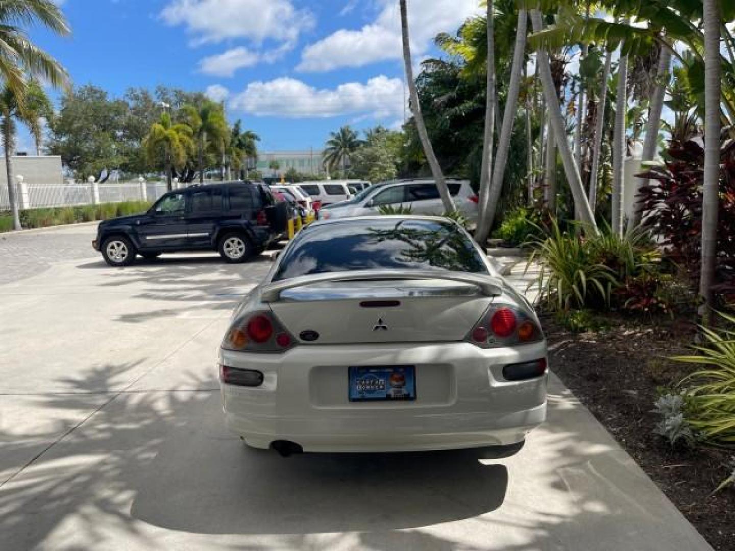 2004 Dover White Pearl /Midnight Mitsubishi Eclipse AUTO GS LOW MILES 57,084 (4A3AC44G24E) with an 2.4L SOHC MPFI 16-Valve I4 Engine engine, Automatic transmission, located at 4701 North Dixie Hwy, Pompano Beach, FL, 33064, (954) 422-2889, 26.240938, -80.123474 - OUR WEBPAGE FLORIDACARS1.COM HAS OVER 100 PHOTOS AND FREE CARFAX LINK 2004 MITSUBISHI ECLIPSE GS VIN: 4A3AC44G24E061723 4 A 3 A C 4 4 G 2 4 E 0 6 1 7 2 3 HATCHBACK 2 DR 2.4L I4 F GASOLINE FRONT WHEEL DRIVE Features Air Conditioning Alloy Wheels AM/FM Stereo Automatic Transmission CD Audio Cloth Seat - Photo#6
