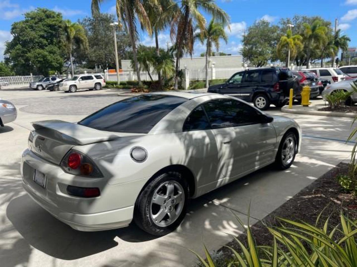 2004 Dover White Pearl /Midnight Mitsubishi Eclipse AUTO GS LOW MILES 57,084 (4A3AC44G24E) with an 2.4L SOHC MPFI 16-Valve I4 Engine engine, Automatic transmission, located at 4701 North Dixie Hwy, Pompano Beach, FL, 33064, (954) 422-2889, 26.240938, -80.123474 - OUR WEBPAGE FLORIDACARS1.COM HAS OVER 100 PHOTOS AND FREE CARFAX LINK 2004 MITSUBISHI ECLIPSE GS VIN: 4A3AC44G24E061723 4 A 3 A C 4 4 G 2 4 E 0 6 1 7 2 3 HATCHBACK 2 DR 2.4L I4 F GASOLINE FRONT WHEEL DRIVE Features Air Conditioning Alloy Wheels AM/FM Stereo Automatic Transmission CD Audio Cloth Seat - Photo#7