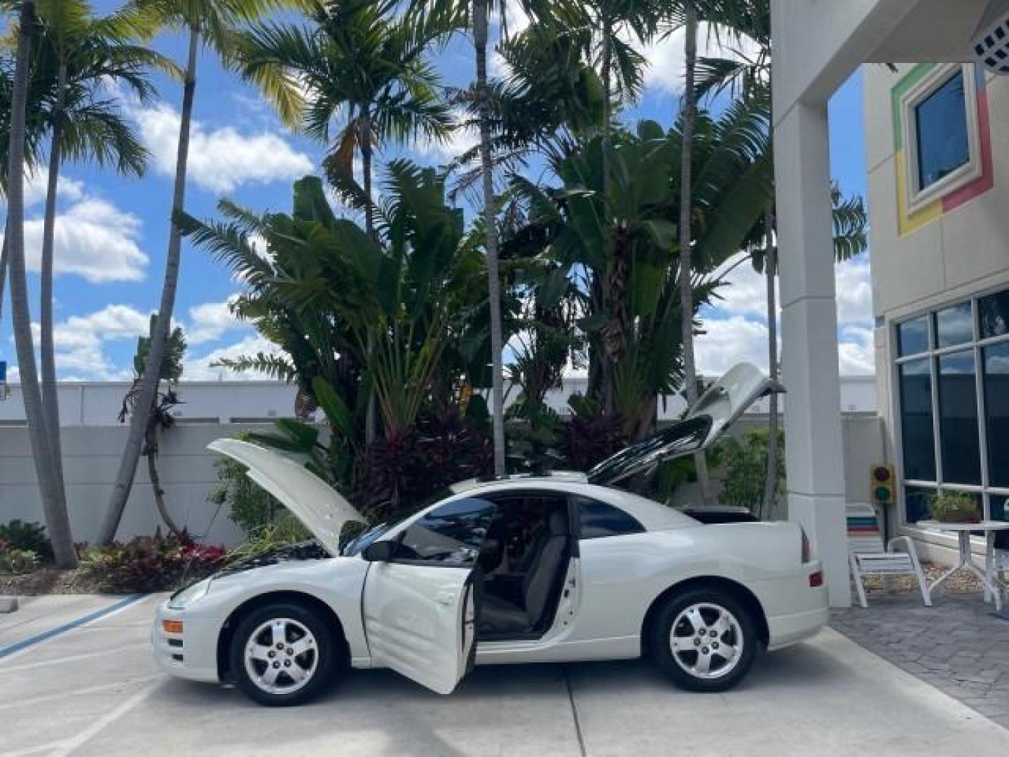 2004 Dover White Pearl /Midnight Mitsubishi Eclipse AUTO GS LOW MILES 57,084 (4A3AC44G24E) with an 2.4L SOHC MPFI 16-Valve I4 Engine engine, Automatic transmission, located at 4701 North Dixie Hwy, Pompano Beach, FL, 33064, (954) 422-2889, 26.240938, -80.123474 - OUR WEBPAGE FLORIDACARS1.COM HAS OVER 100 PHOTOS AND FREE CARFAX LINK 2004 MITSUBISHI ECLIPSE GS VIN: 4A3AC44G24E061723 4 A 3 A C 4 4 G 2 4 E 0 6 1 7 2 3 HATCHBACK 2 DR 2.4L I4 F GASOLINE FRONT WHEEL DRIVE Features Air Conditioning Alloy Wheels AM/FM Stereo Automatic Transmission CD Audio Cloth Seat - Photo#8