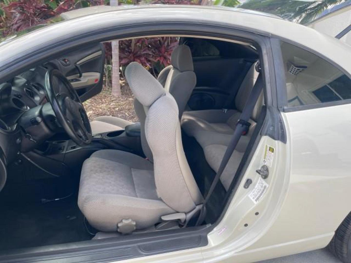 2004 Dover White Pearl /Midnight Mitsubishi Eclipse AUTO GS LOW MILES 57,084 (4A3AC44G24E) with an 2.4L SOHC MPFI 16-Valve I4 Engine engine, Automatic transmission, located at 4701 North Dixie Hwy, Pompano Beach, FL, 33064, (954) 422-2889, 26.240938, -80.123474 - OUR WEBPAGE FLORIDACARS1.COM HAS OVER 100 PHOTOS AND FREE CARFAX LINK 2004 MITSUBISHI ECLIPSE GS VIN: 4A3AC44G24E061723 4 A 3 A C 4 4 G 2 4 E 0 6 1 7 2 3 HATCHBACK 2 DR 2.4L I4 F GASOLINE FRONT WHEEL DRIVE Features Air Conditioning Alloy Wheels AM/FM Stereo Automatic Transmission CD Audio Cloth Seat - Photo#13