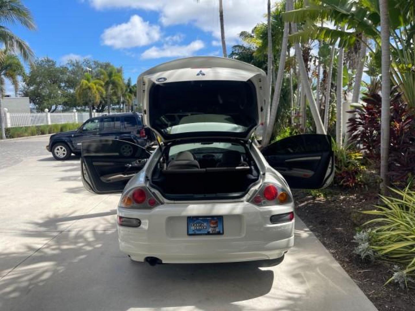 2004 Dover White Pearl /Midnight Mitsubishi Eclipse AUTO GS LOW MILES 57,084 (4A3AC44G24E) with an 2.4L SOHC MPFI 16-Valve I4 Engine engine, Automatic transmission, located at 4701 North Dixie Hwy, Pompano Beach, FL, 33064, (954) 422-2889, 26.240938, -80.123474 - OUR WEBPAGE FLORIDACARS1.COM HAS OVER 100 PHOTOS AND FREE CARFAX LINK 2004 MITSUBISHI ECLIPSE GS VIN: 4A3AC44G24E061723 4 A 3 A C 4 4 G 2 4 E 0 6 1 7 2 3 HATCHBACK 2 DR 2.4L I4 F GASOLINE FRONT WHEEL DRIVE Features Air Conditioning Alloy Wheels AM/FM Stereo Automatic Transmission CD Audio Cloth Seat - Photo#15