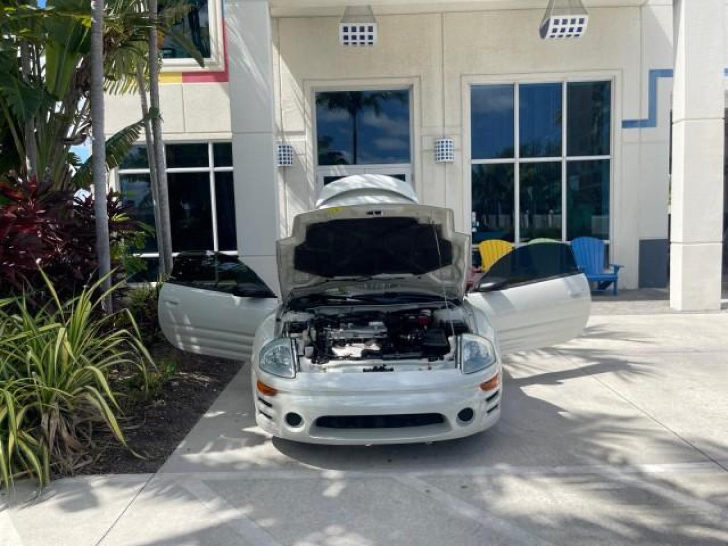 2004 Dover White Pearl /Midnight Mitsubishi Eclipse AUTO GS LOW MILES 57,084 (4A3AC44G24E) with an 2.4L SOHC MPFI 16-Valve I4 Engine engine, Automatic transmission, located at 4701 North Dixie Hwy, Pompano Beach, FL, 33064, (954) 422-2889, 26.240938, -80.123474 - OUR WEBPAGE FLORIDACARS1.COM HAS OVER 100 PHOTOS AND FREE CARFAX LINK 2004 MITSUBISHI ECLIPSE GS VIN: 4A3AC44G24E061723 4 A 3 A C 4 4 G 2 4 E 0 6 1 7 2 3 HATCHBACK 2 DR 2.4L I4 F GASOLINE FRONT WHEEL DRIVE Features Air Conditioning Alloy Wheels AM/FM Stereo Automatic Transmission CD Audio Cloth Seat - Photo#16