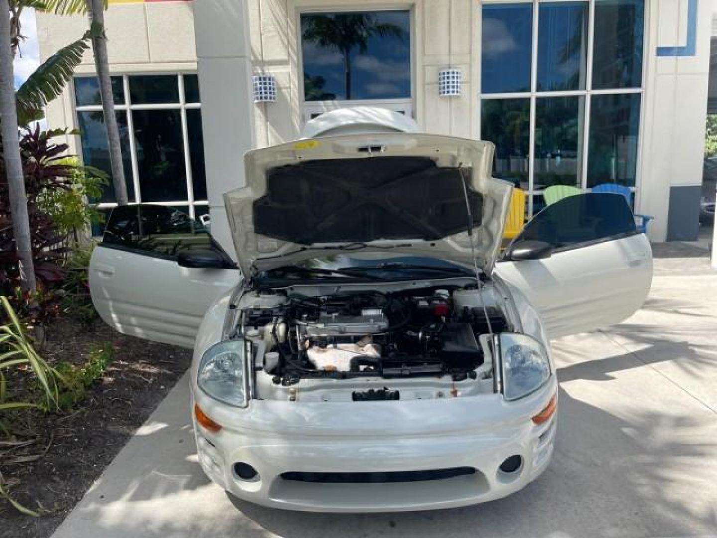 2004 Dover White Pearl /Midnight Mitsubishi Eclipse AUTO GS LOW MILES 57,084 (4A3AC44G24E) with an 2.4L SOHC MPFI 16-Valve I4 Engine engine, Automatic transmission, located at 4701 North Dixie Hwy, Pompano Beach, FL, 33064, (954) 422-2889, 26.240938, -80.123474 - OUR WEBPAGE FLORIDACARS1.COM HAS OVER 100 PHOTOS AND FREE CARFAX LINK 2004 MITSUBISHI ECLIPSE GS VIN: 4A3AC44G24E061723 4 A 3 A C 4 4 G 2 4 E 0 6 1 7 2 3 HATCHBACK 2 DR 2.4L I4 F GASOLINE FRONT WHEEL DRIVE Features Air Conditioning Alloy Wheels AM/FM Stereo Automatic Transmission CD Audio Cloth Seat - Photo#17