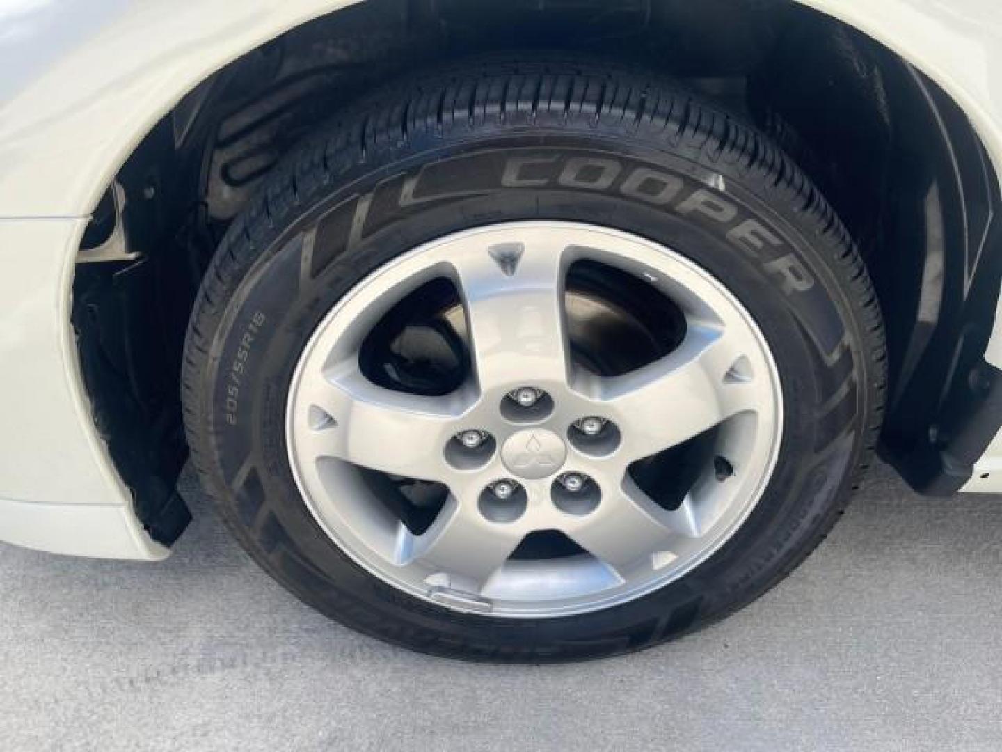 2004 Dover White Pearl /Midnight Mitsubishi Eclipse AUTO GS LOW MILES 57,084 (4A3AC44G24E) with an 2.4L SOHC MPFI 16-Valve I4 Engine engine, Automatic transmission, located at 4701 North Dixie Hwy, Pompano Beach, FL, 33064, (954) 422-2889, 26.240938, -80.123474 - OUR WEBPAGE FLORIDACARS1.COM HAS OVER 100 PHOTOS AND FREE CARFAX LINK 2004 MITSUBISHI ECLIPSE GS VIN: 4A3AC44G24E061723 4 A 3 A C 4 4 G 2 4 E 0 6 1 7 2 3 HATCHBACK 2 DR 2.4L I4 F GASOLINE FRONT WHEEL DRIVE Features Air Conditioning Alloy Wheels AM/FM Stereo Automatic Transmission CD Audio Cloth Seat - Photo#19